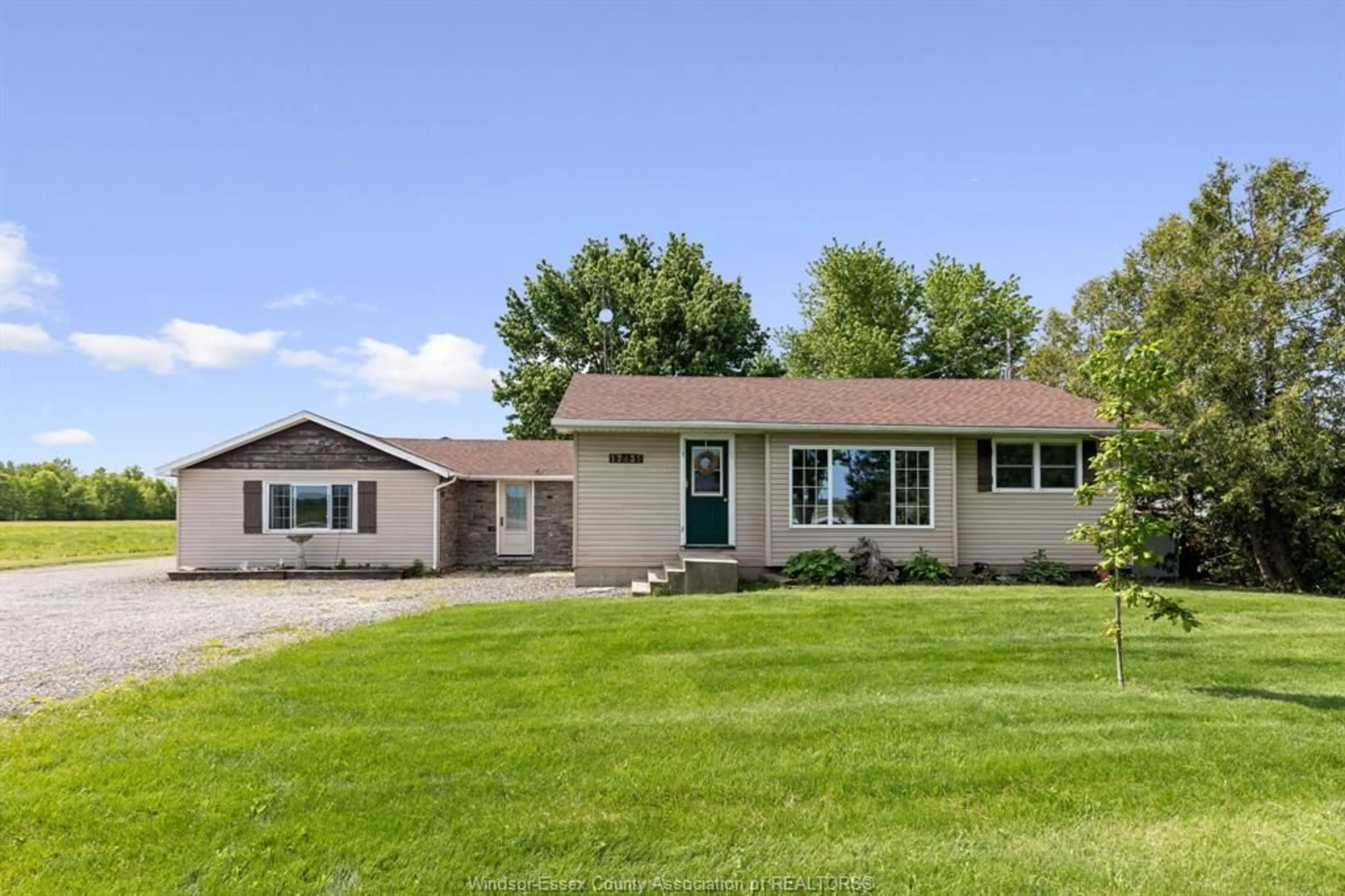 Home with vinyl exterior material, street for 17825 LAKESHORE RD 303, Tilbury North Ontario N0P 2L0