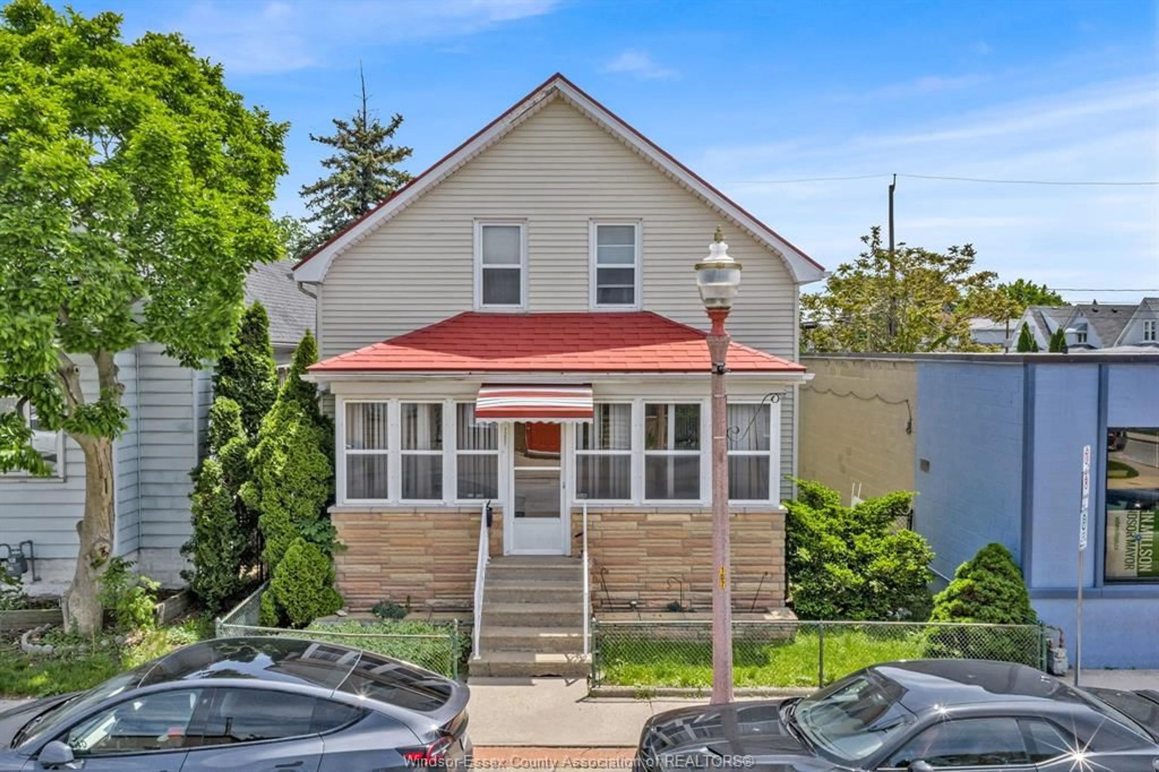A pic from outside/outdoor area/front of a property/back of a property/a pic from drone, street for 1221 ERIE, Windsor Ontario N9A 3Z6