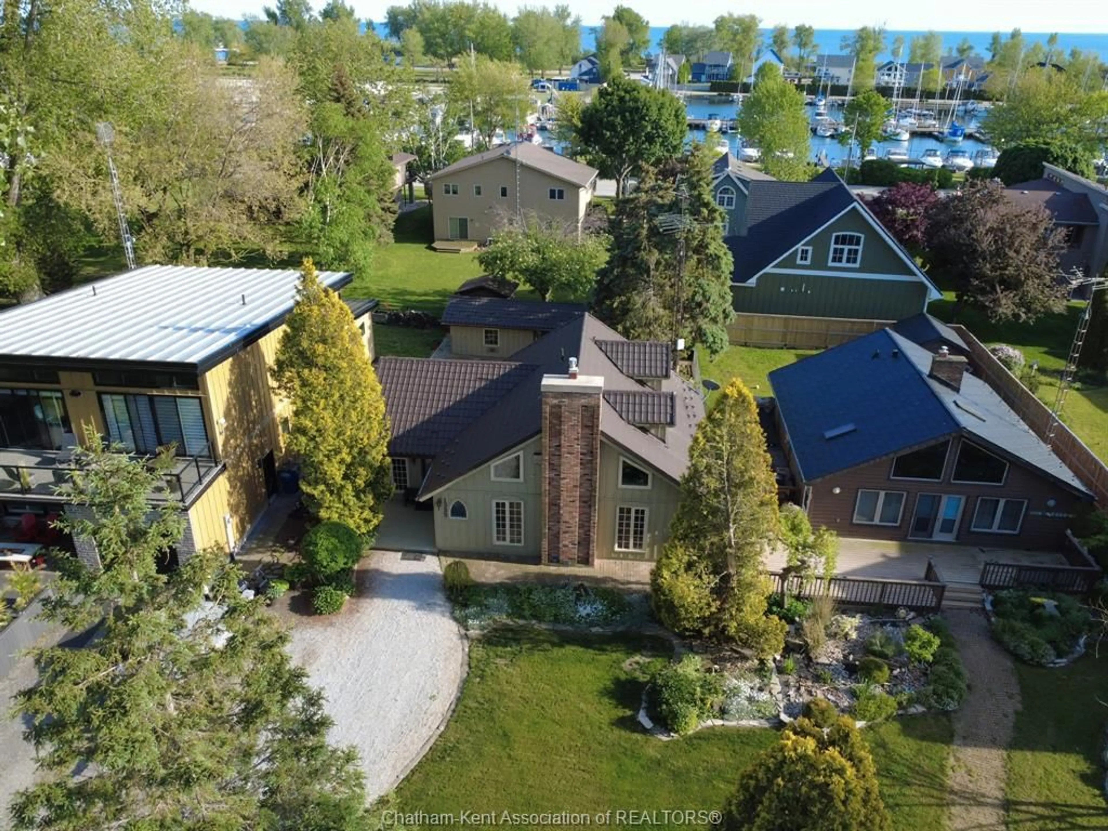 A pic from outside/outdoor area/front of a property/back of a property/a pic from drone, water/lake/river/ocean view for 1355 KERR Ave, Erieau Ontario N0P 1N0