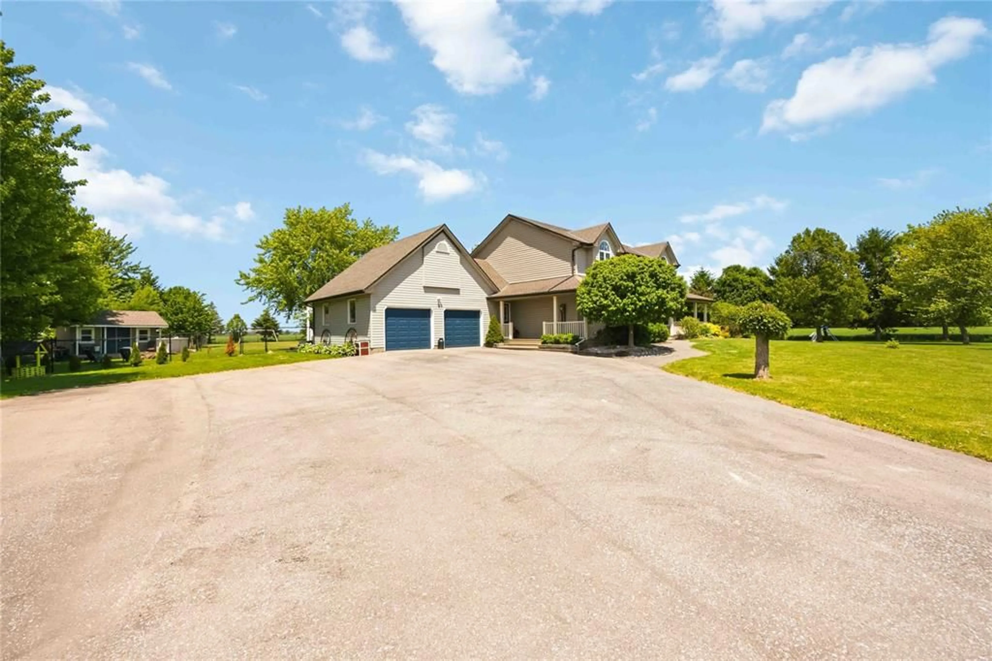 A pic from outside/outdoor area/front of a property/back of a property/a pic from drone, water/lake/river/ocean view for 6052 COURTRIGHT Line, Oil Springs Ontario N0N 1P0