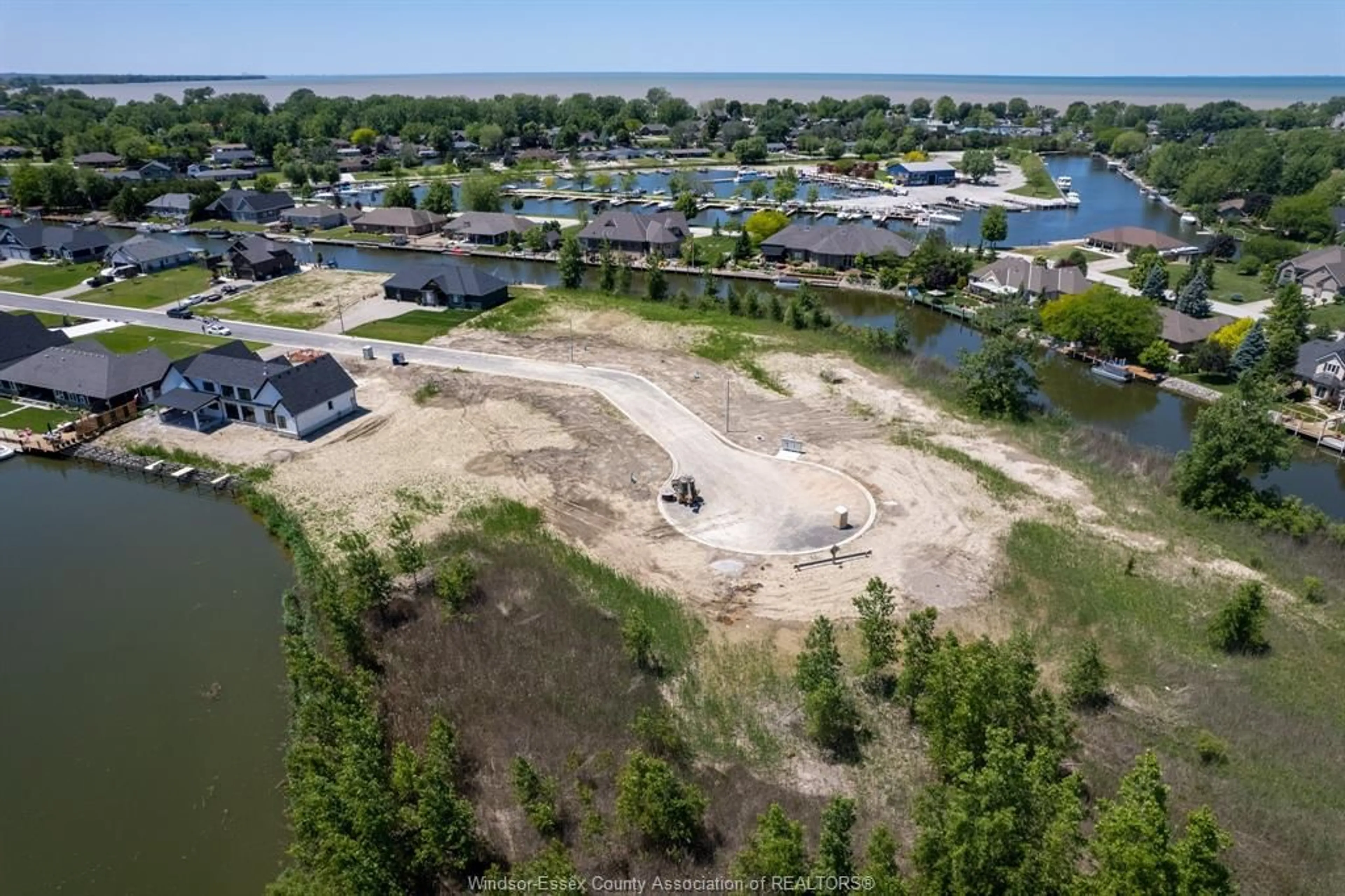 A pic from outside/outdoor area/front of a property/back of a property/a pic from drone, water/lake/river/ocean view for 19130 HAVEN Ave, Lakeshore Ontario N0P 2L0