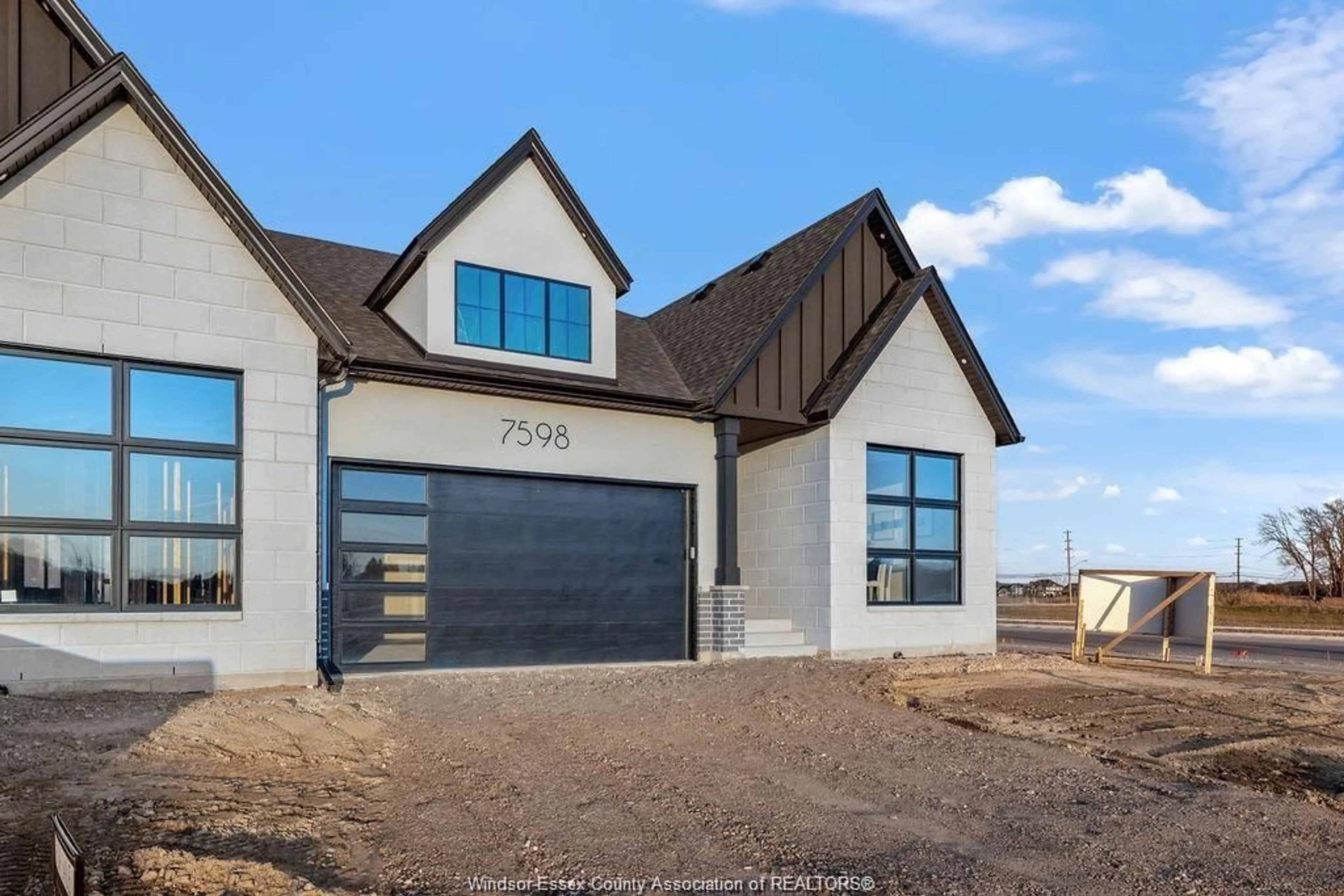 Home with brick exterior material, street for 7548 SILVERLEAF Lane, LaSalle Ontario N9H 1H3
