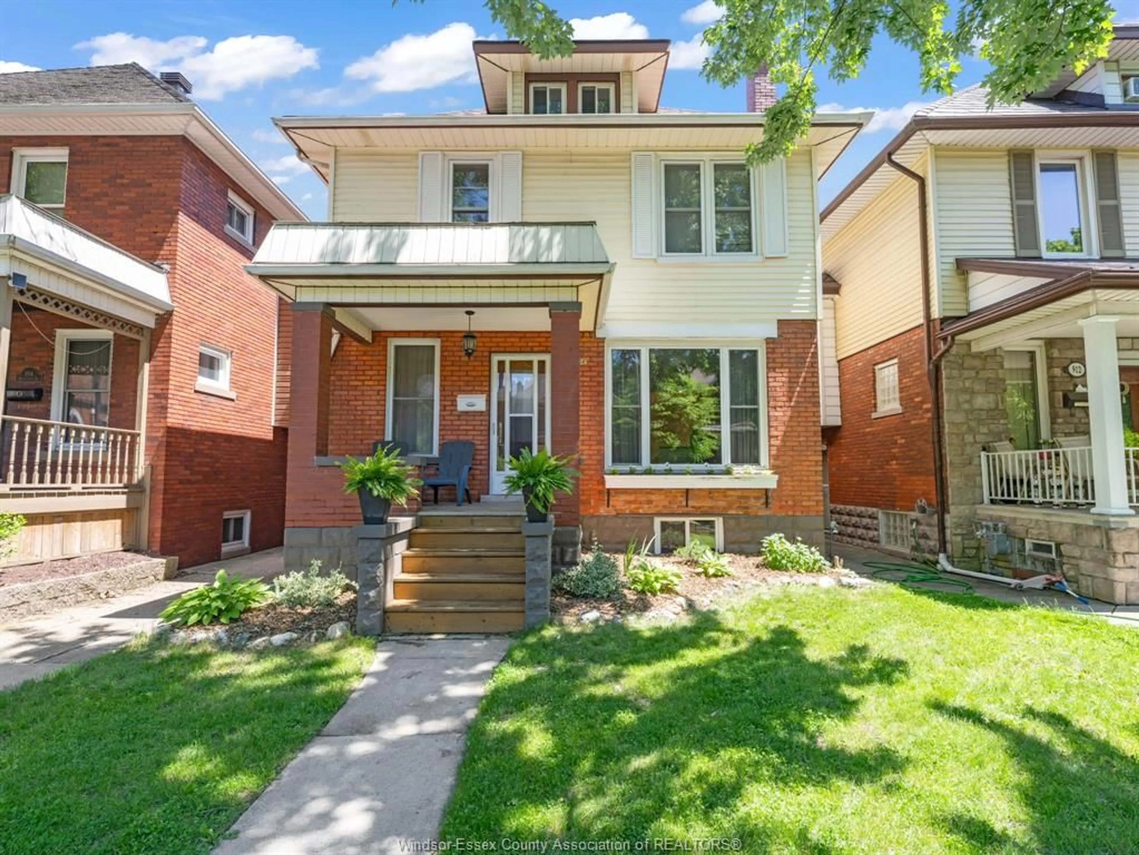 Home with brick exterior material, street for 908 WINDERMERE Rd, Windsor Ontario N8Y 3E4
