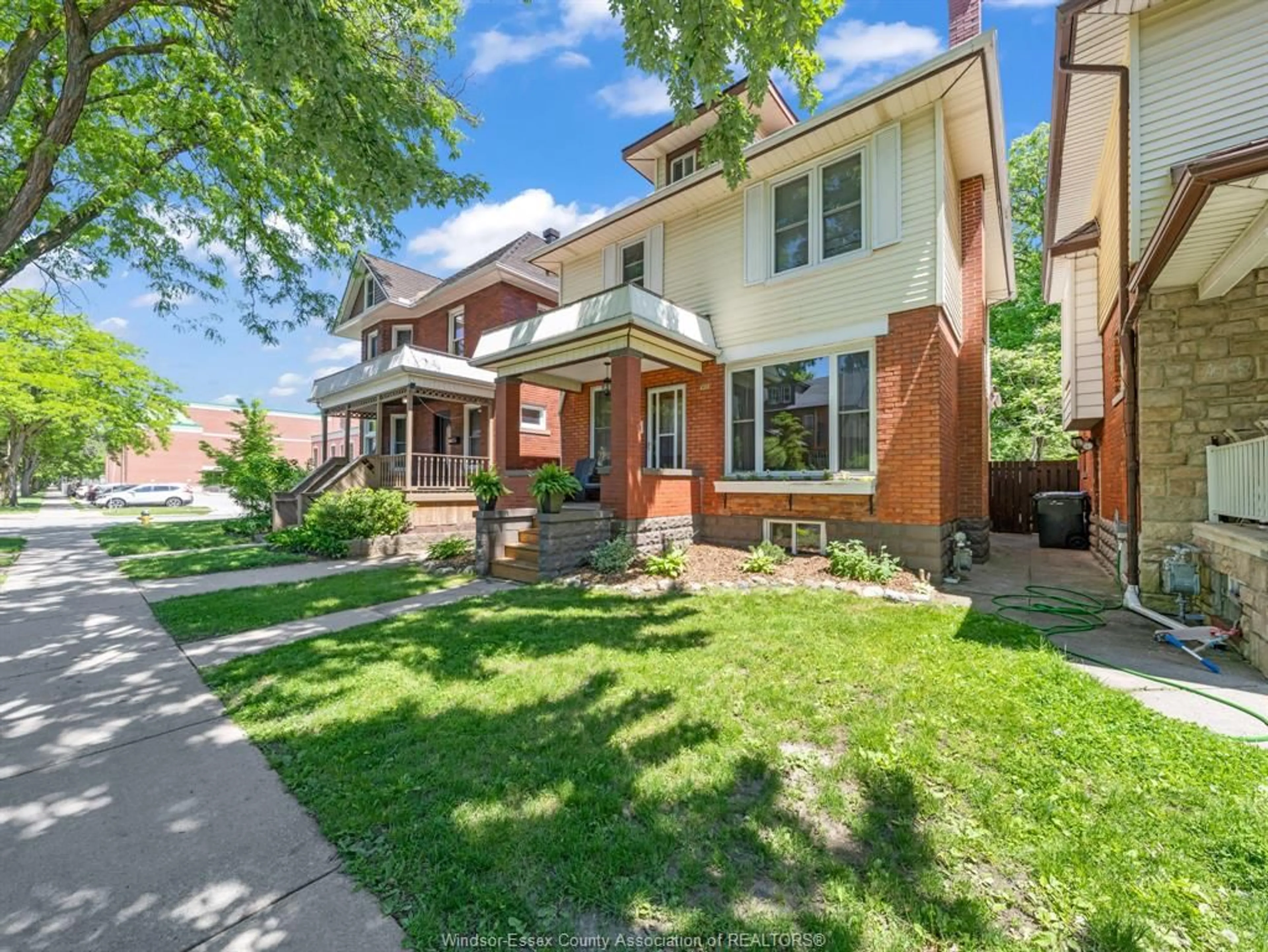 Home with brick exterior material, street for 908 WINDERMERE Rd, Windsor Ontario N8Y 3E4