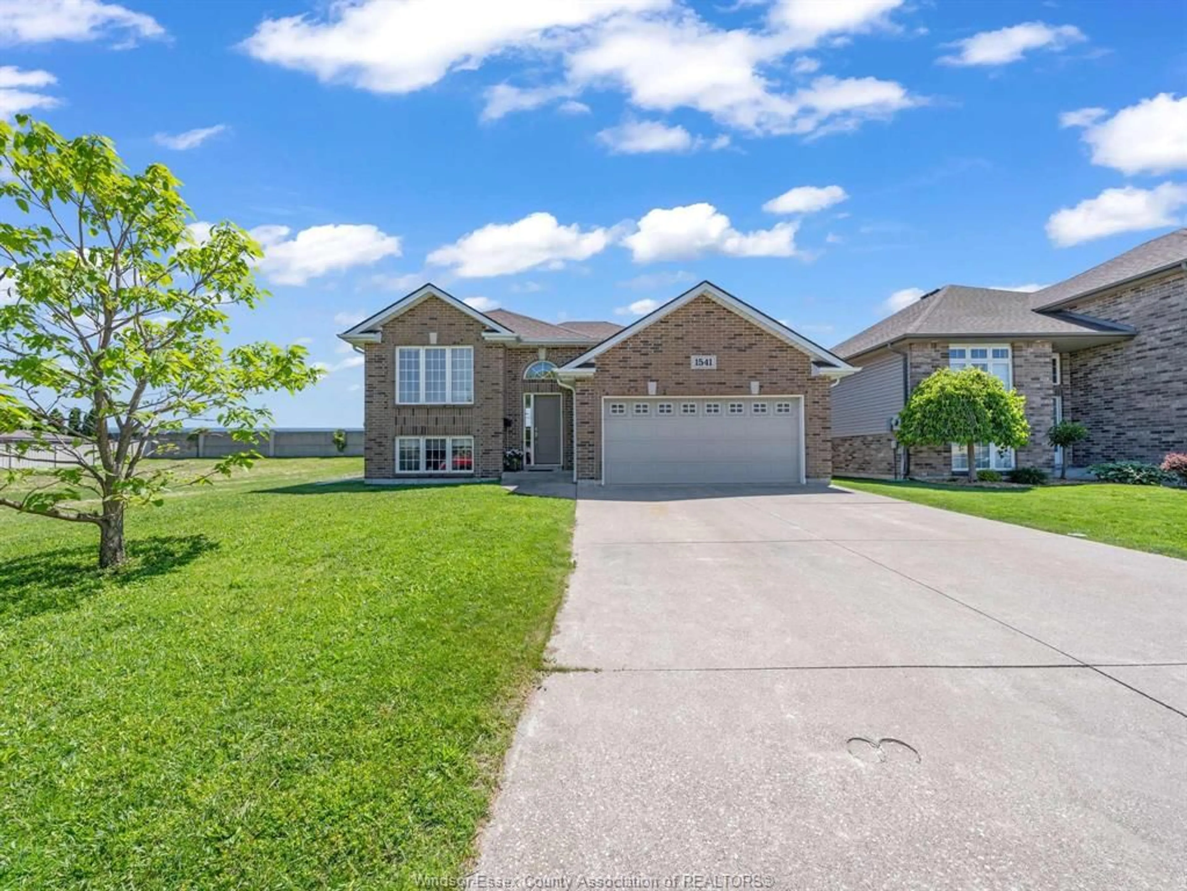 Home with brick exterior material, water/lake/river/ocean view for 1541 Heatherglen Dr, Tecumseh Ontario N8N 5B3