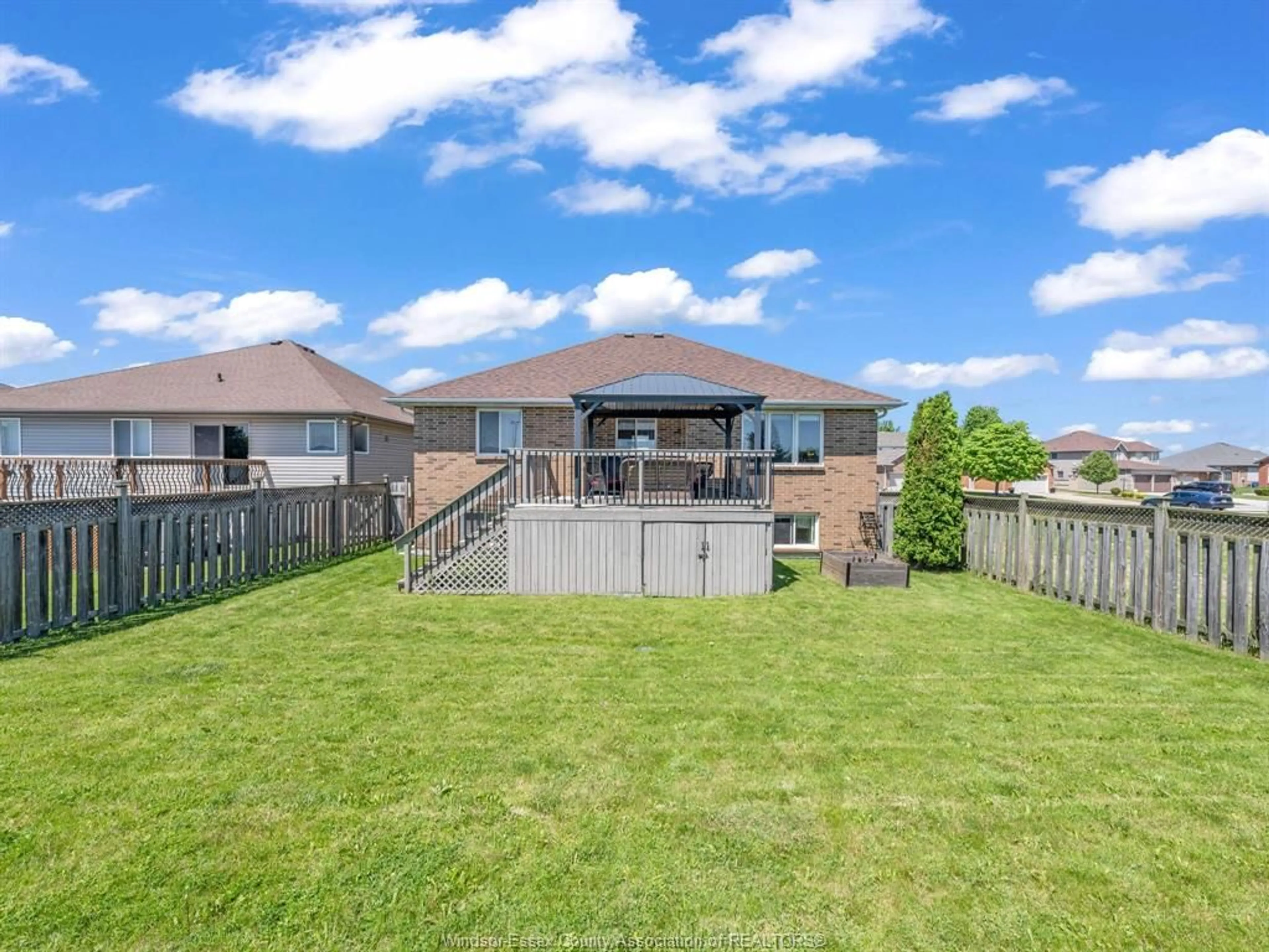 A pic from outside/outdoor area/front of a property/back of a property/a pic from drone, water/lake/river/ocean view for 1541 Heatherglen Dr, Tecumseh Ontario N8N 5B3