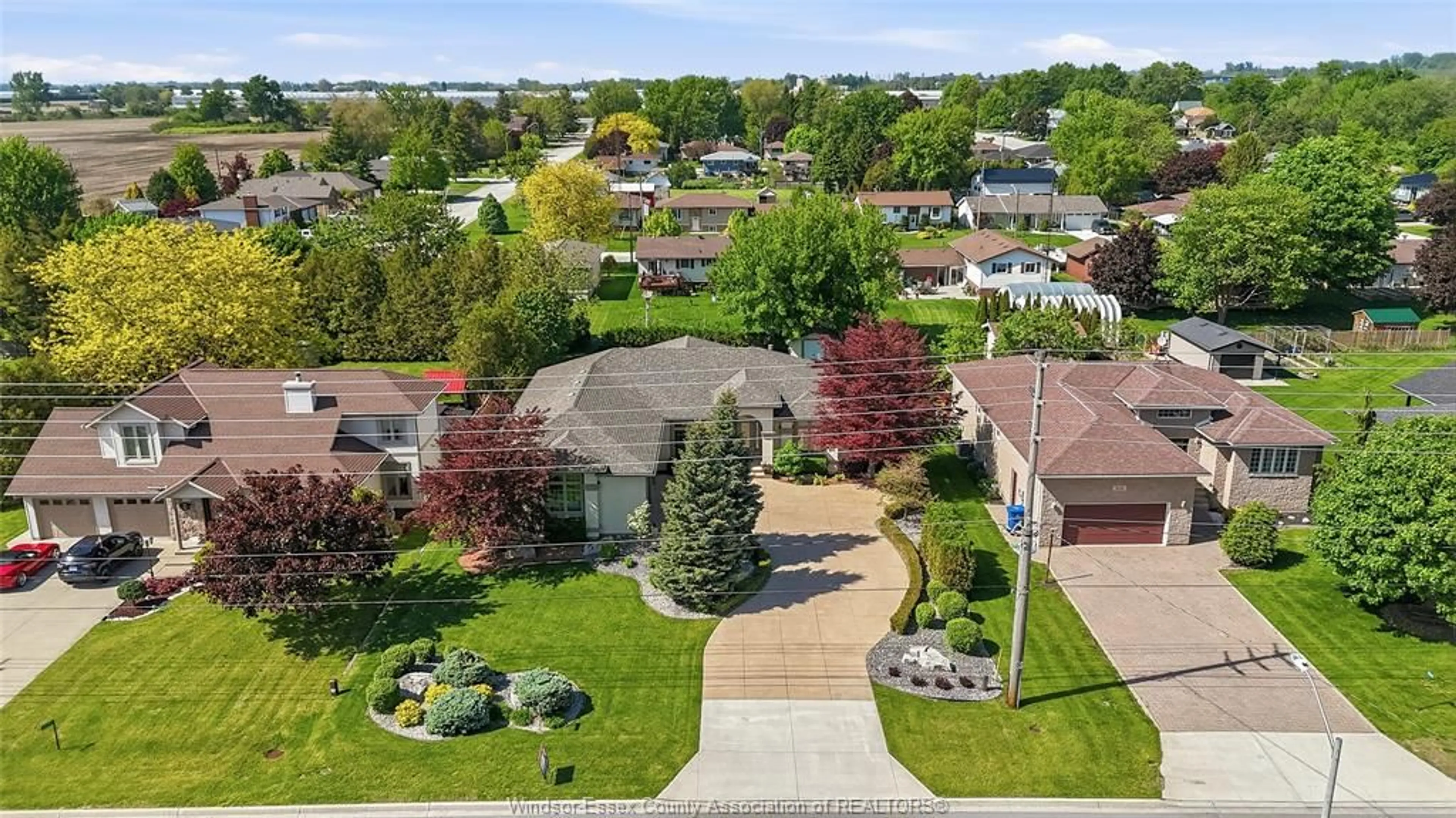 A pic from outside/outdoor area/front of a property/back of a property/a pic from drone, street for 1612 Road 2, Kingsville Ontario N0P 2G0