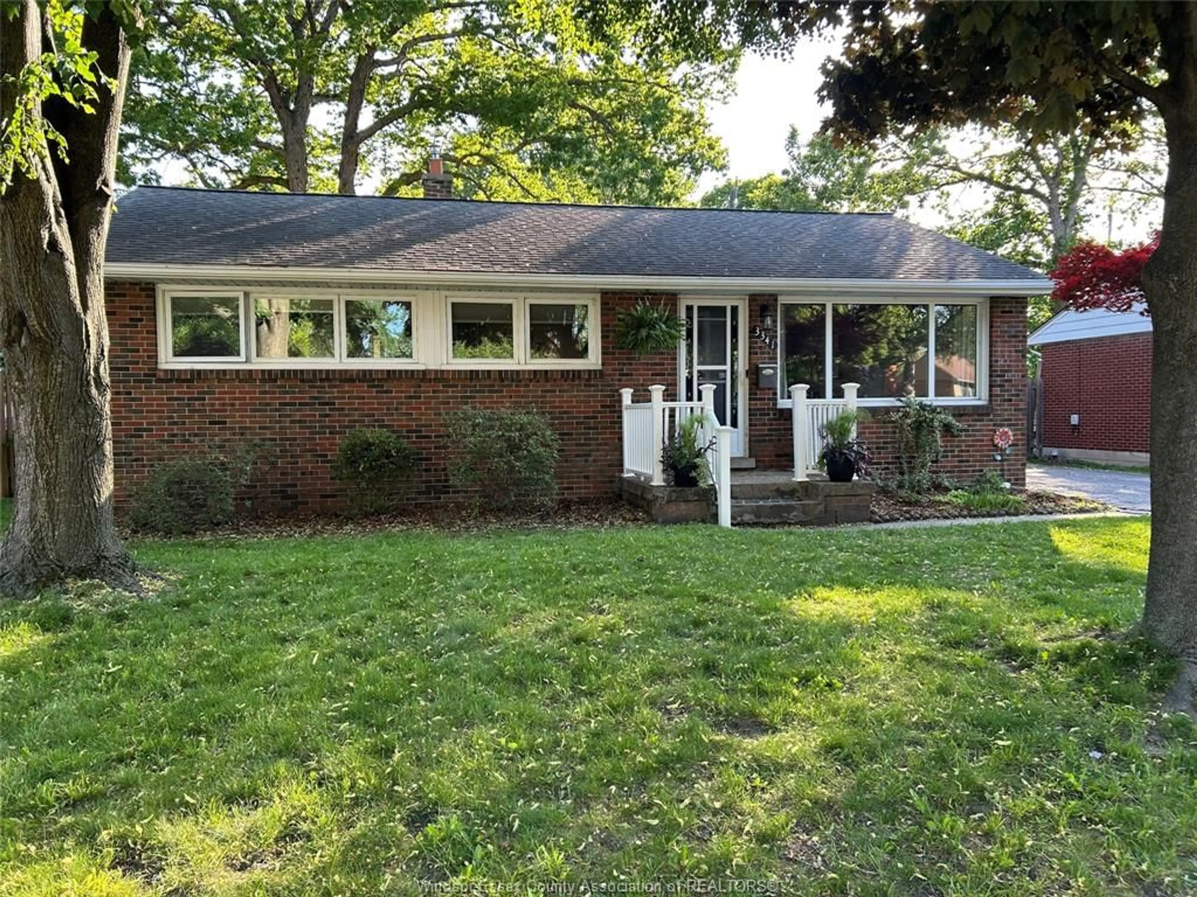 Home with brick exterior material, street for 3341 Mark Ave, Windsor Ontario N9E 2X2