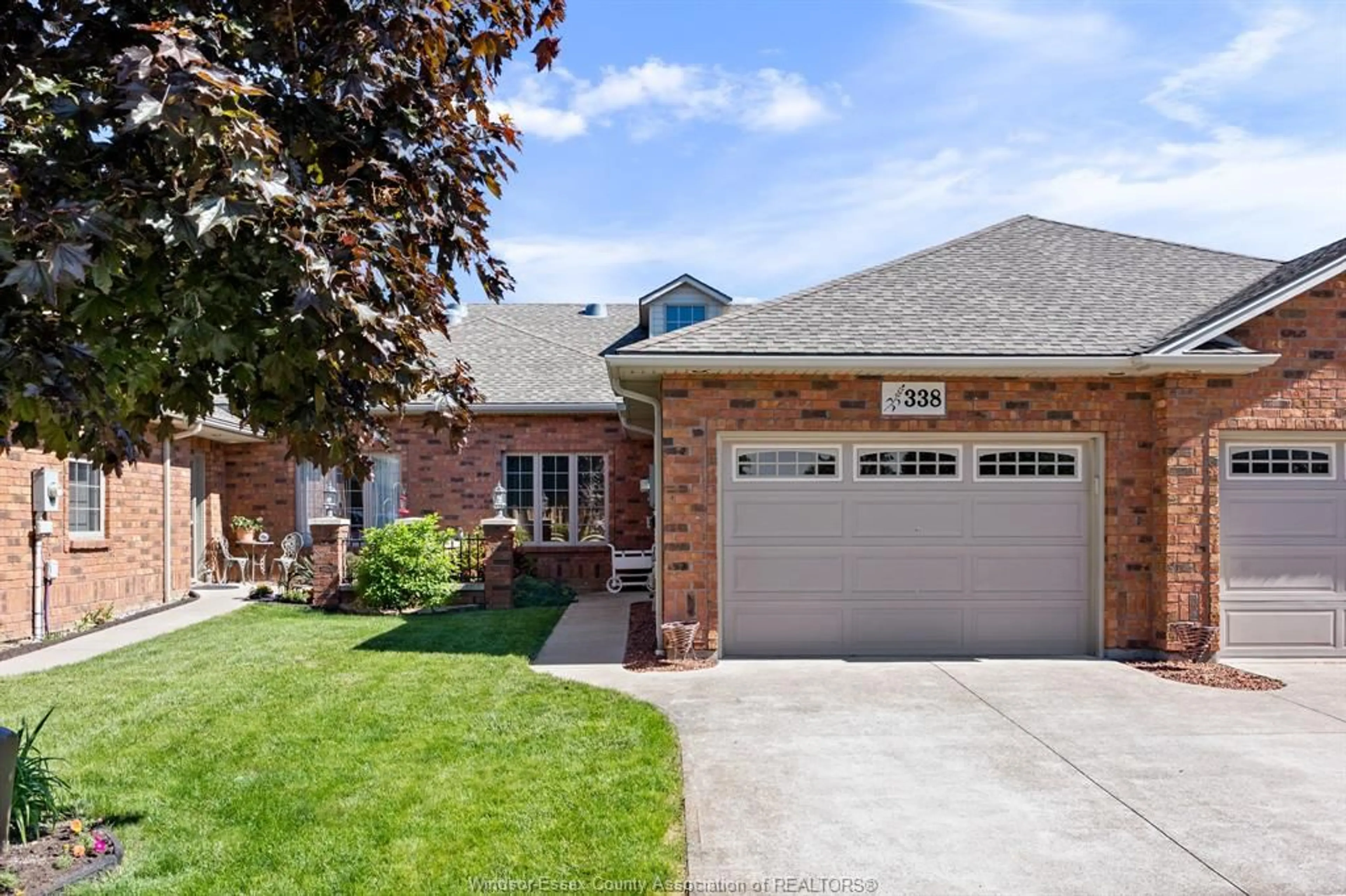 Home with brick exterior material, street for 338 COOPER Cres, Belle River Ontario N0R 1A0