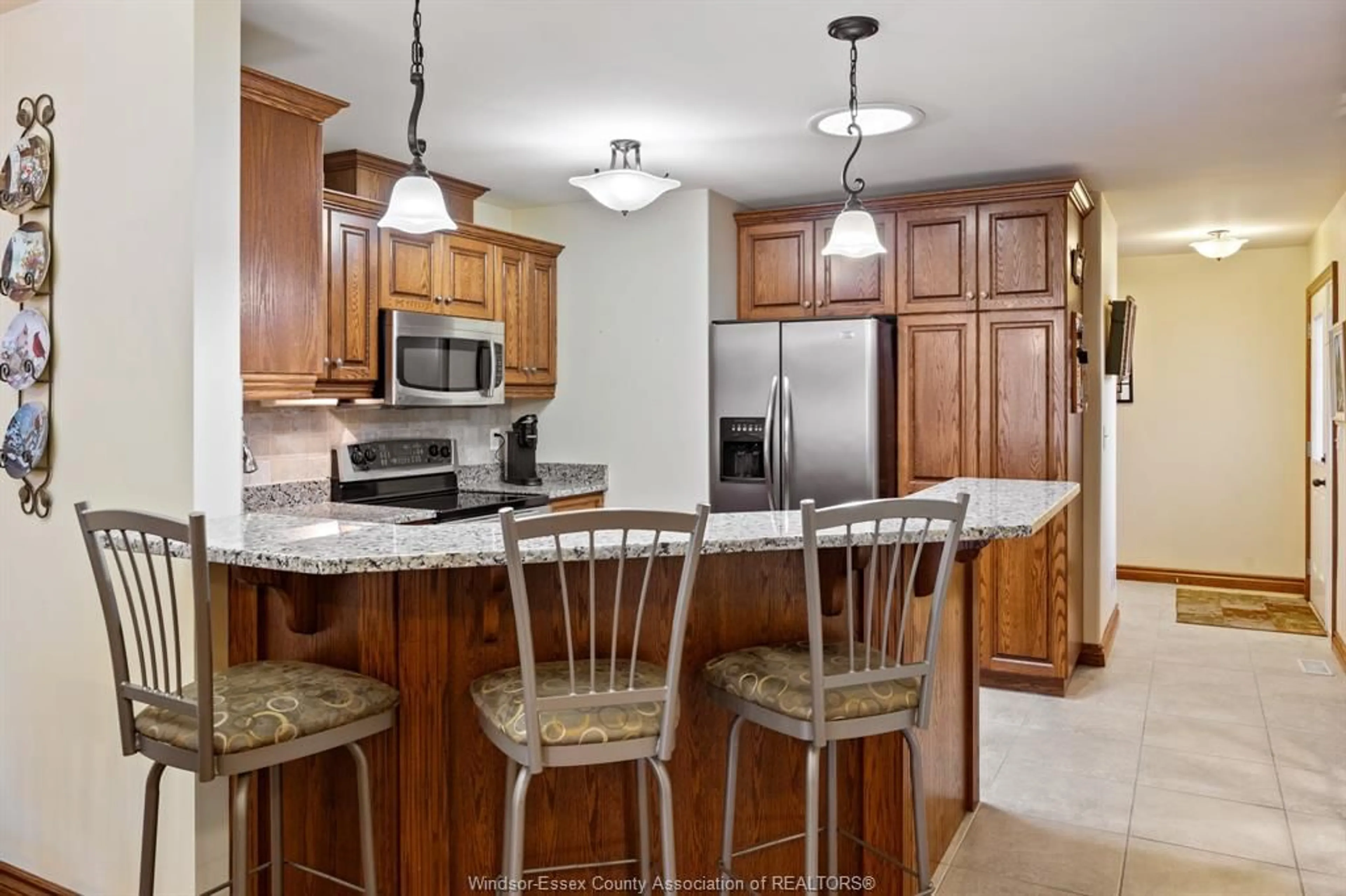 Open concept kitchen, ceramic/tile floor for 338 COOPER Cres, Belle River Ontario N0R 1A0