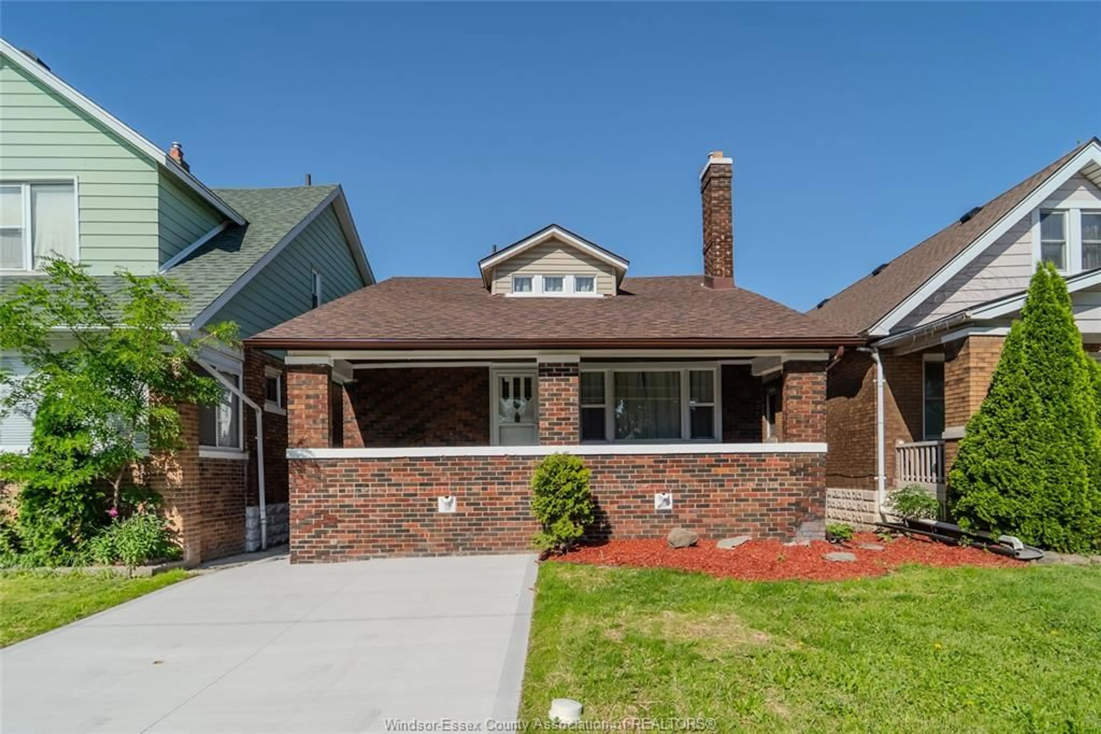 Home with brick exterior material, street for 1422 Elsmere Ave, Windsor Ontario N8X 4G9