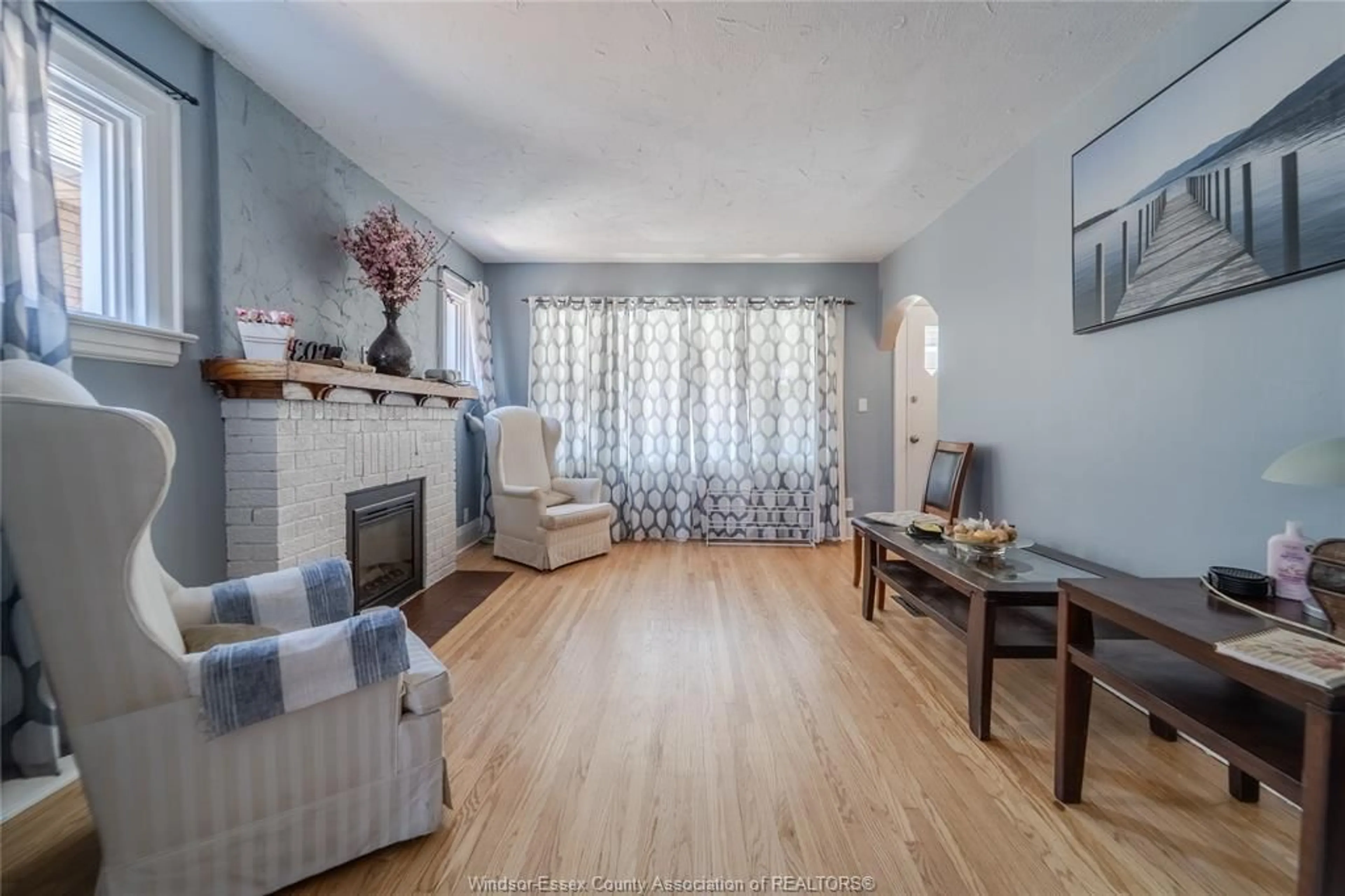 Living room with furniture, wood/laminate floor for 1422 Elsmere Ave, Windsor Ontario N8X 4G9