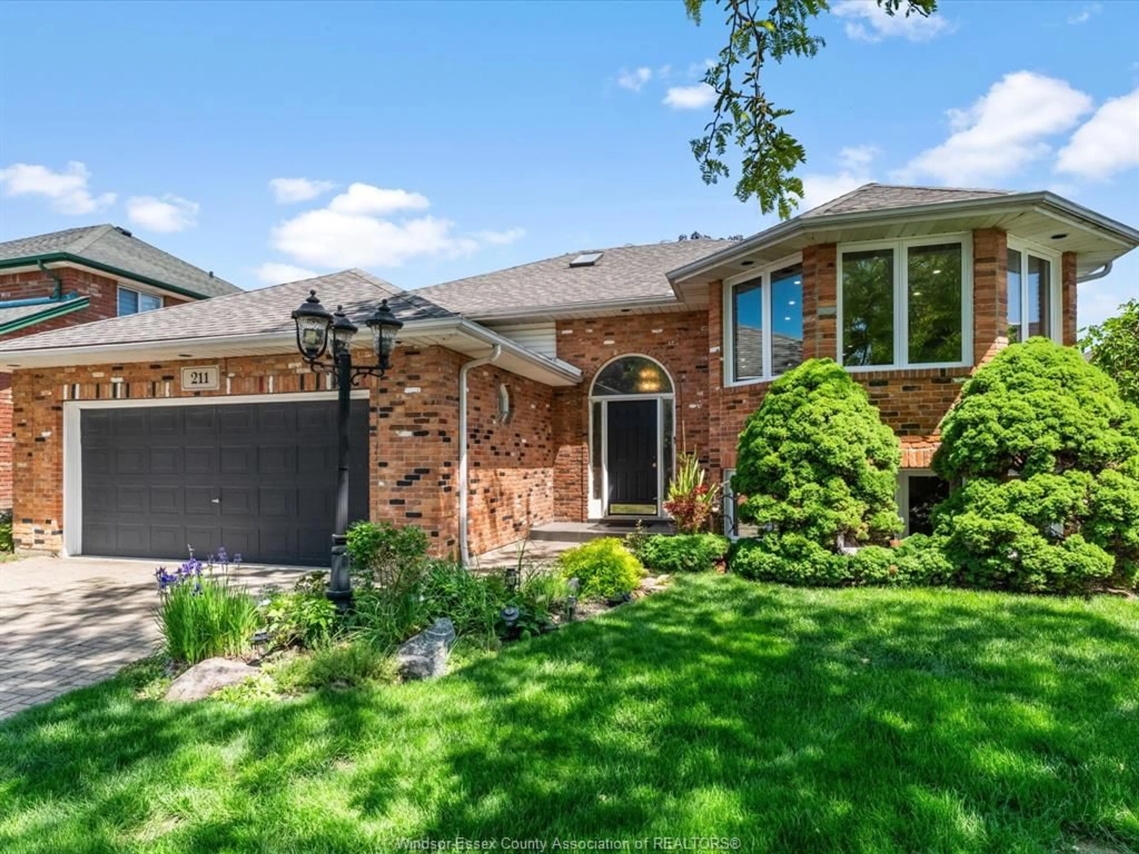 Home with brick exterior material, street for 211 Sunnyside, LaSalle Ontario N9J 3J2