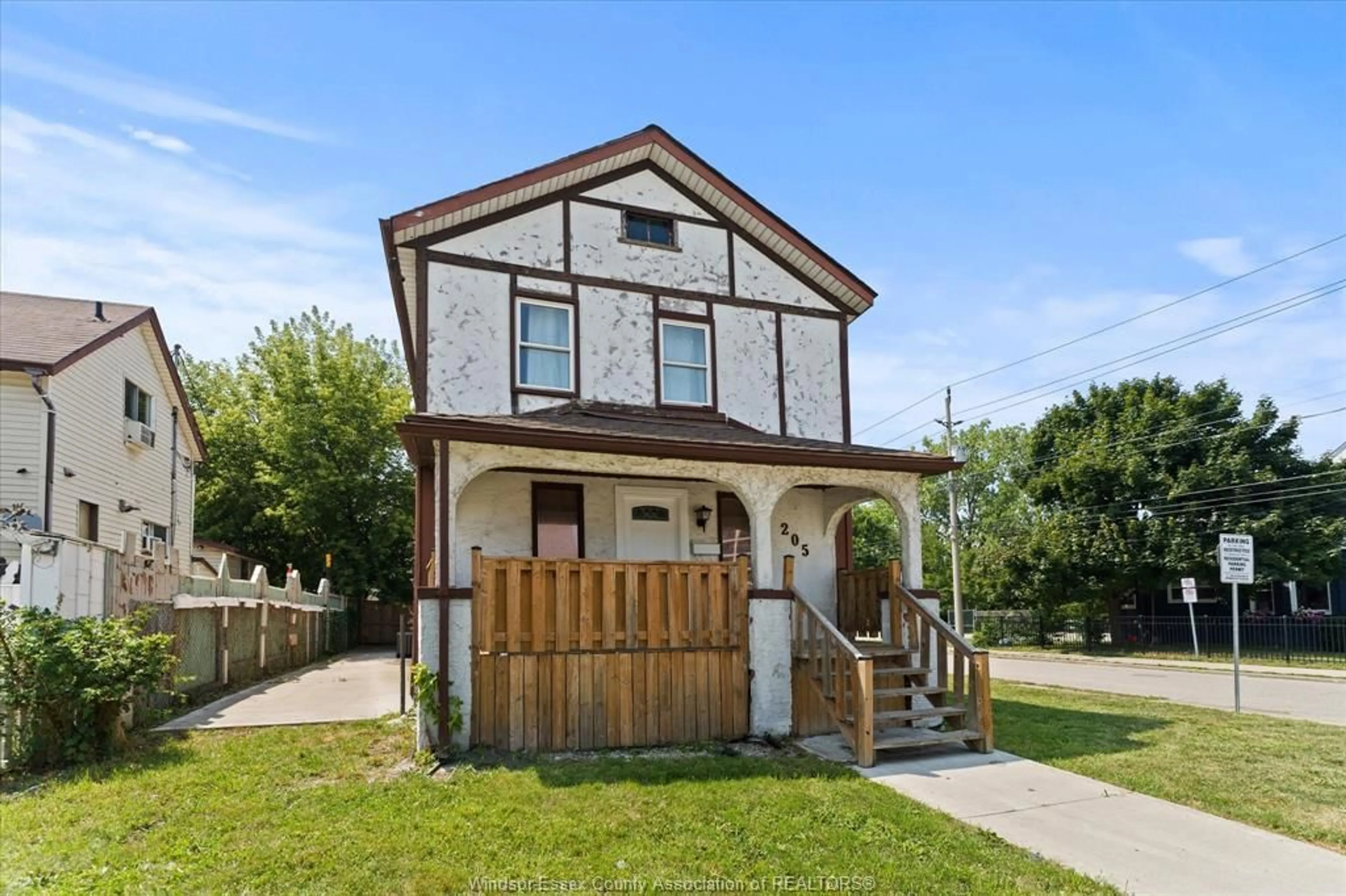 Home with brick exterior material, street for 205 PARENT Ave, Windsor Ontario N9A 2B5