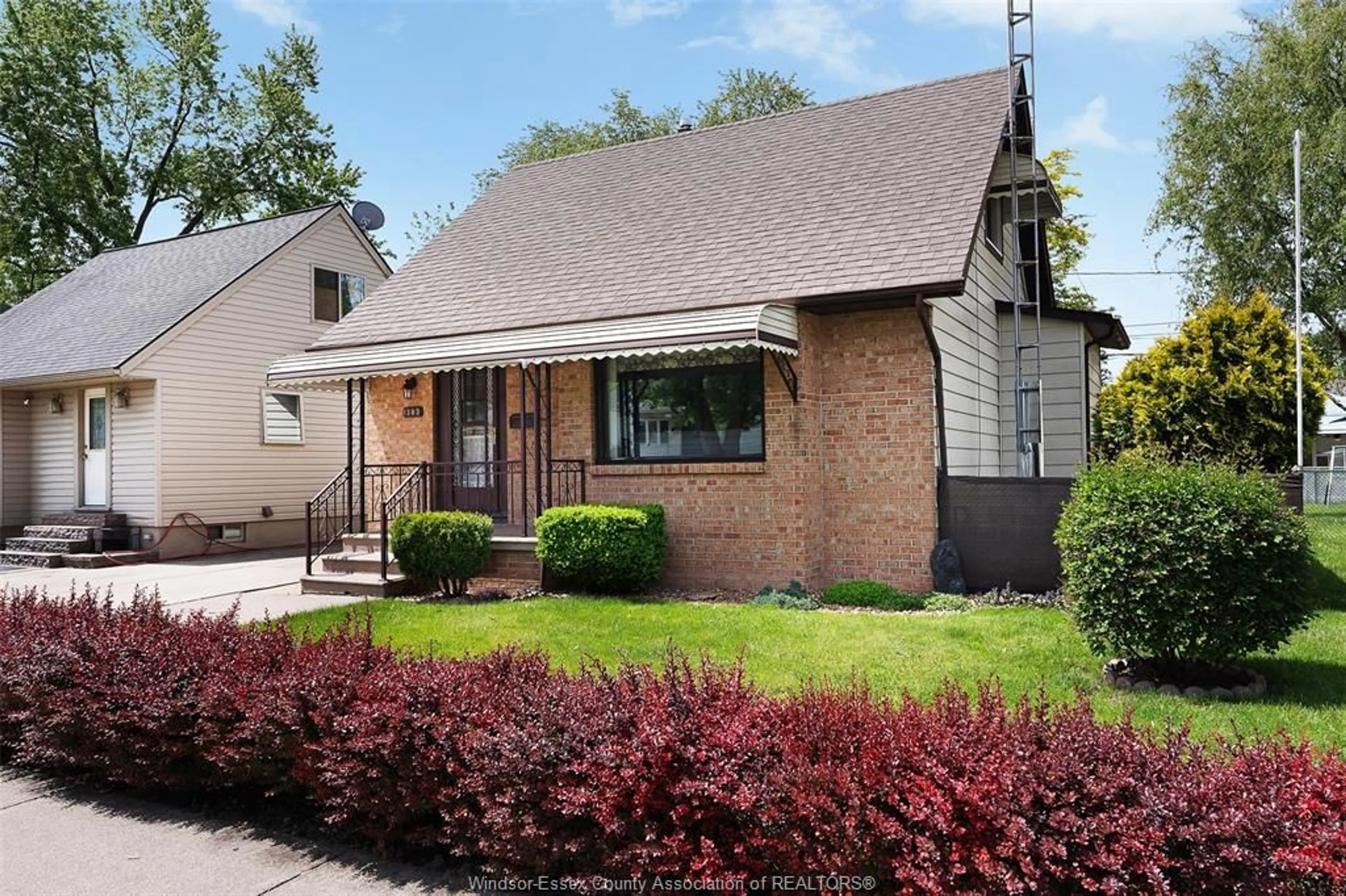 Home with brick exterior material, street for 1393 TOURANGEAU, Windsor Ontario N8Y 4J1