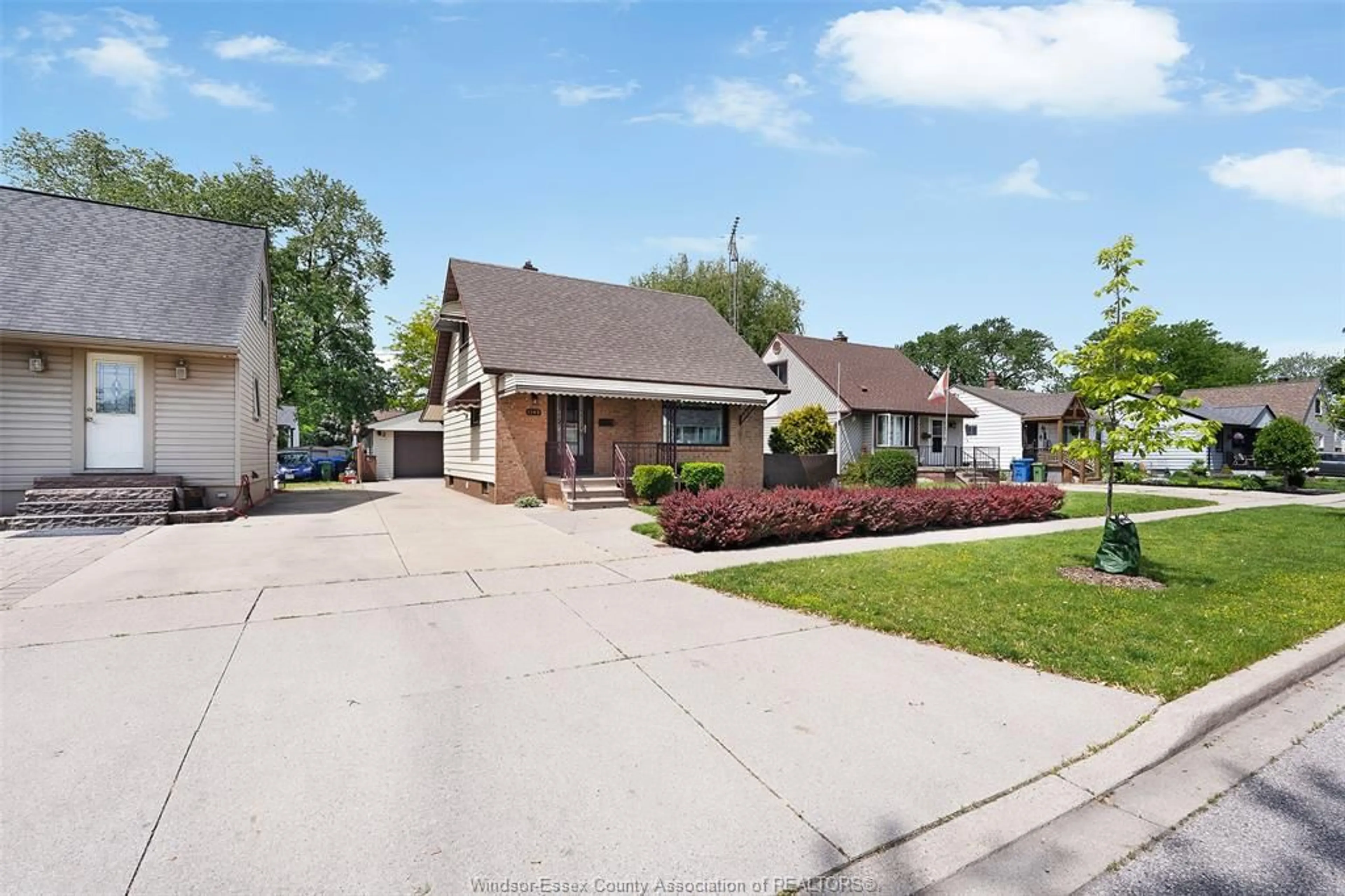 Home with brick exterior material, street for 1393 TOURANGEAU, Windsor Ontario N8Y 4J1