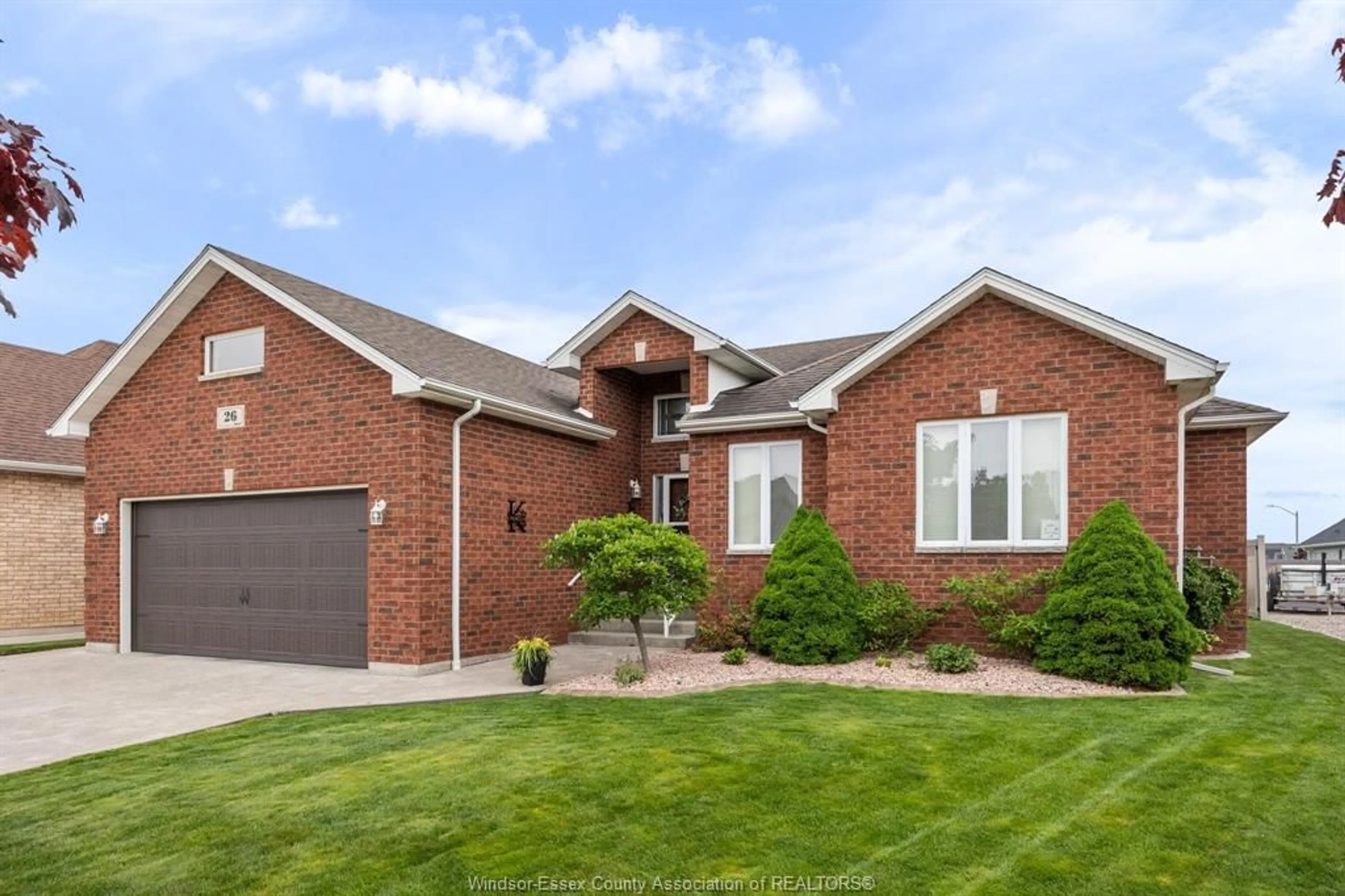 Home with brick exterior material, street for 26 MARSHWOODS Blvd, Kingsville Ontario N9Y 0A7
