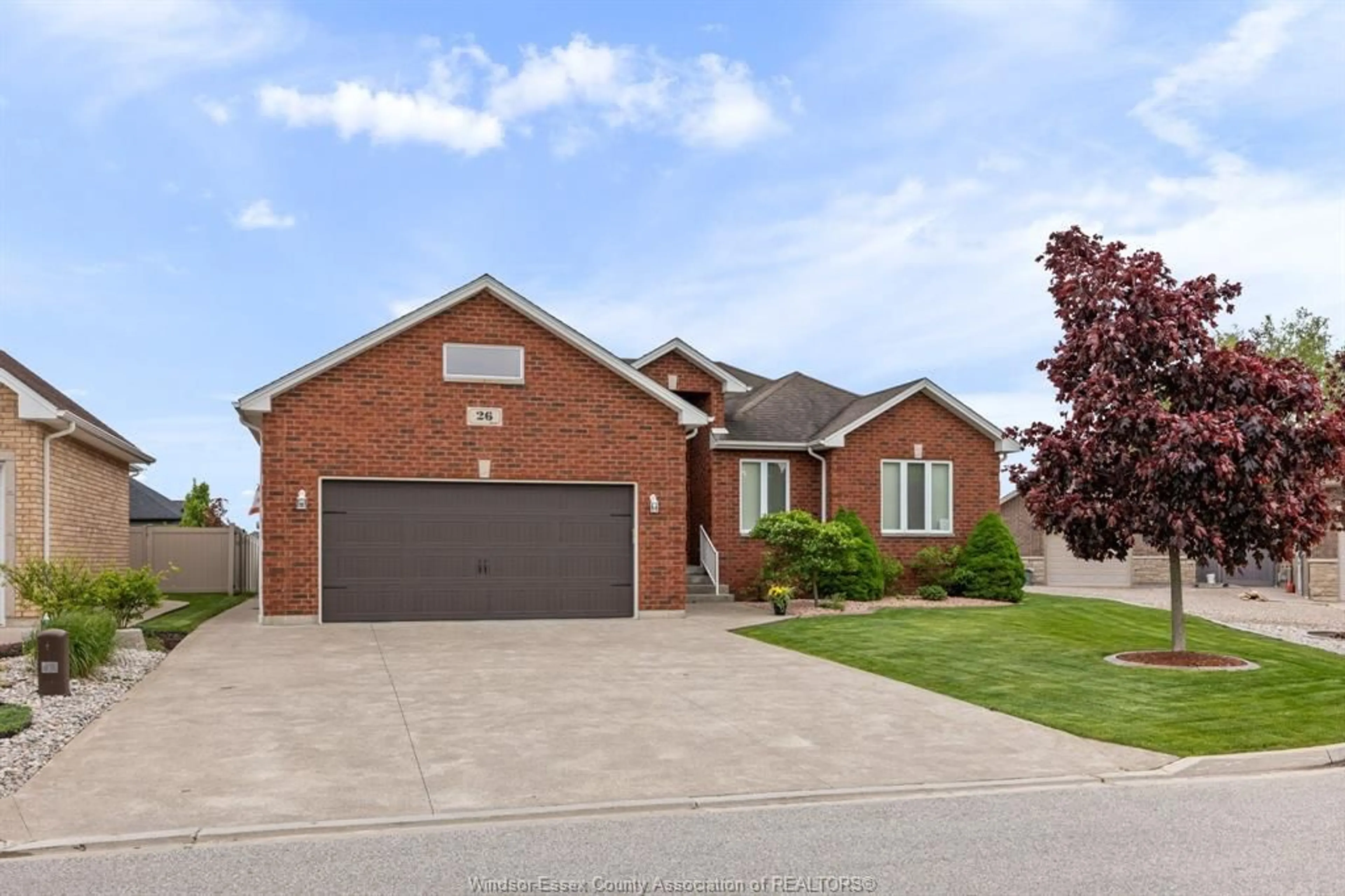 Home with brick exterior material, street for 26 MARSHWOODS Blvd, Kingsville Ontario N9Y 0A7