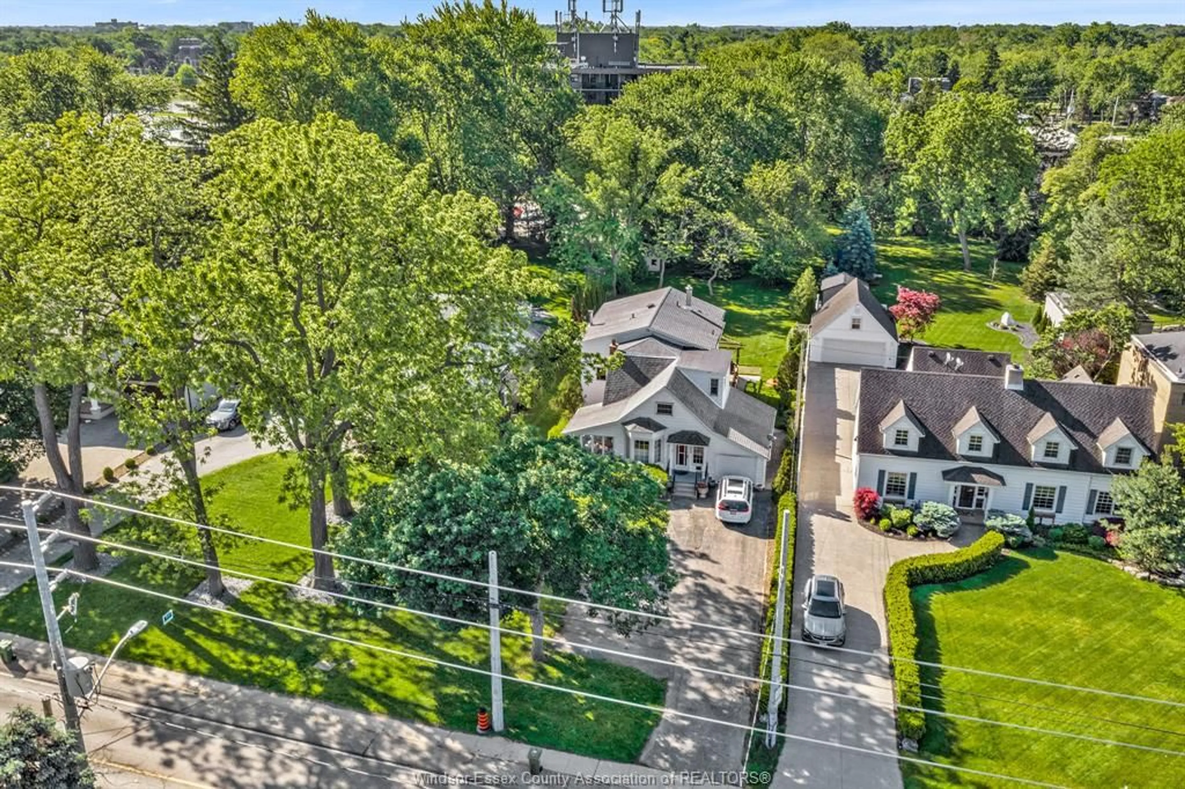 A pic from outside/outdoor area/front of a property/back of a property/a pic from drone, street for 6565 RIVERSIDE Dr, Windsor Ontario N8S 1C1