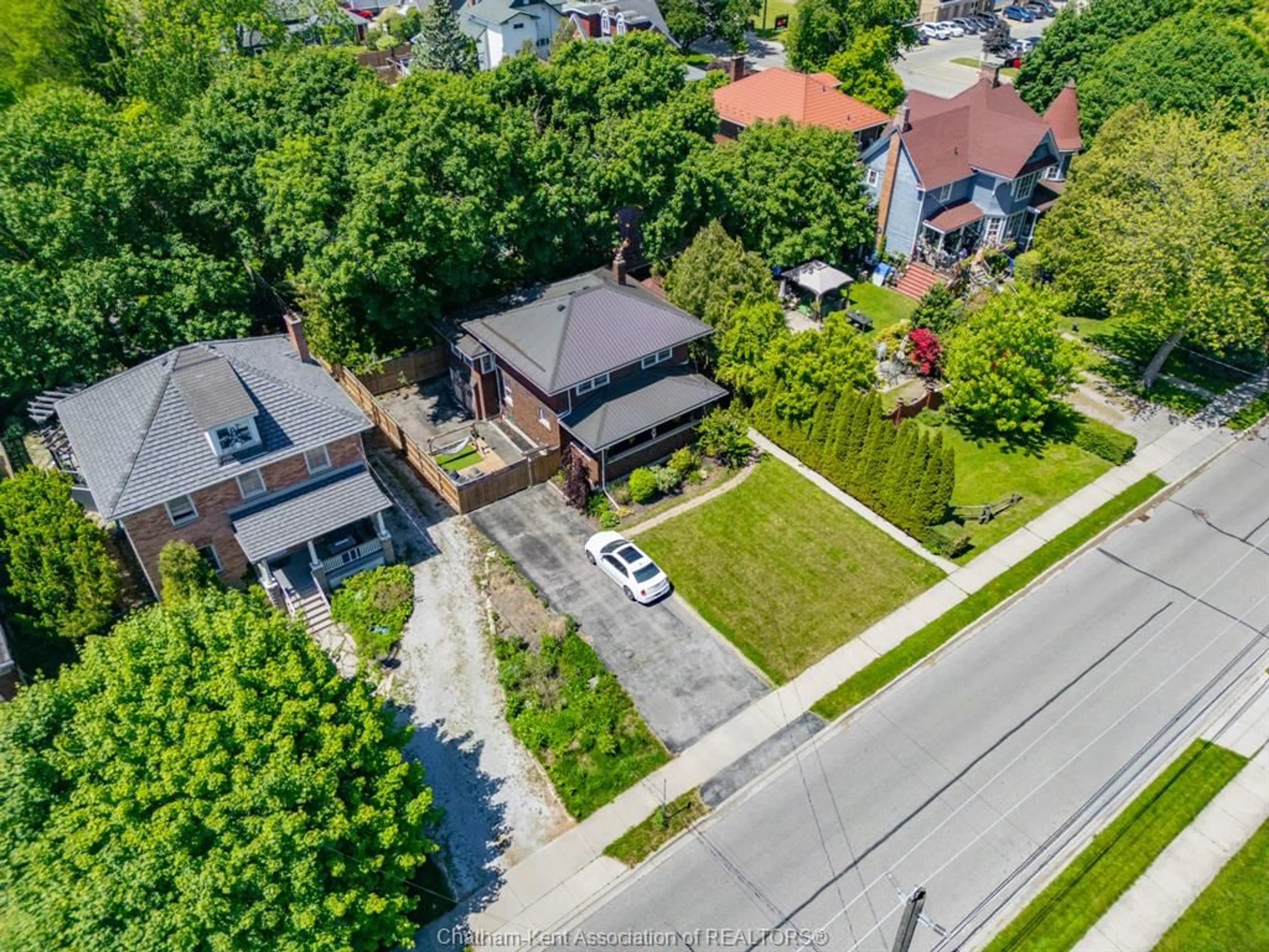 A pic from outside/outdoor area/front of a property/back of a property/a pic from drone, street for 38 Inshes Ave, Chatham Ontario N7M 2Y7