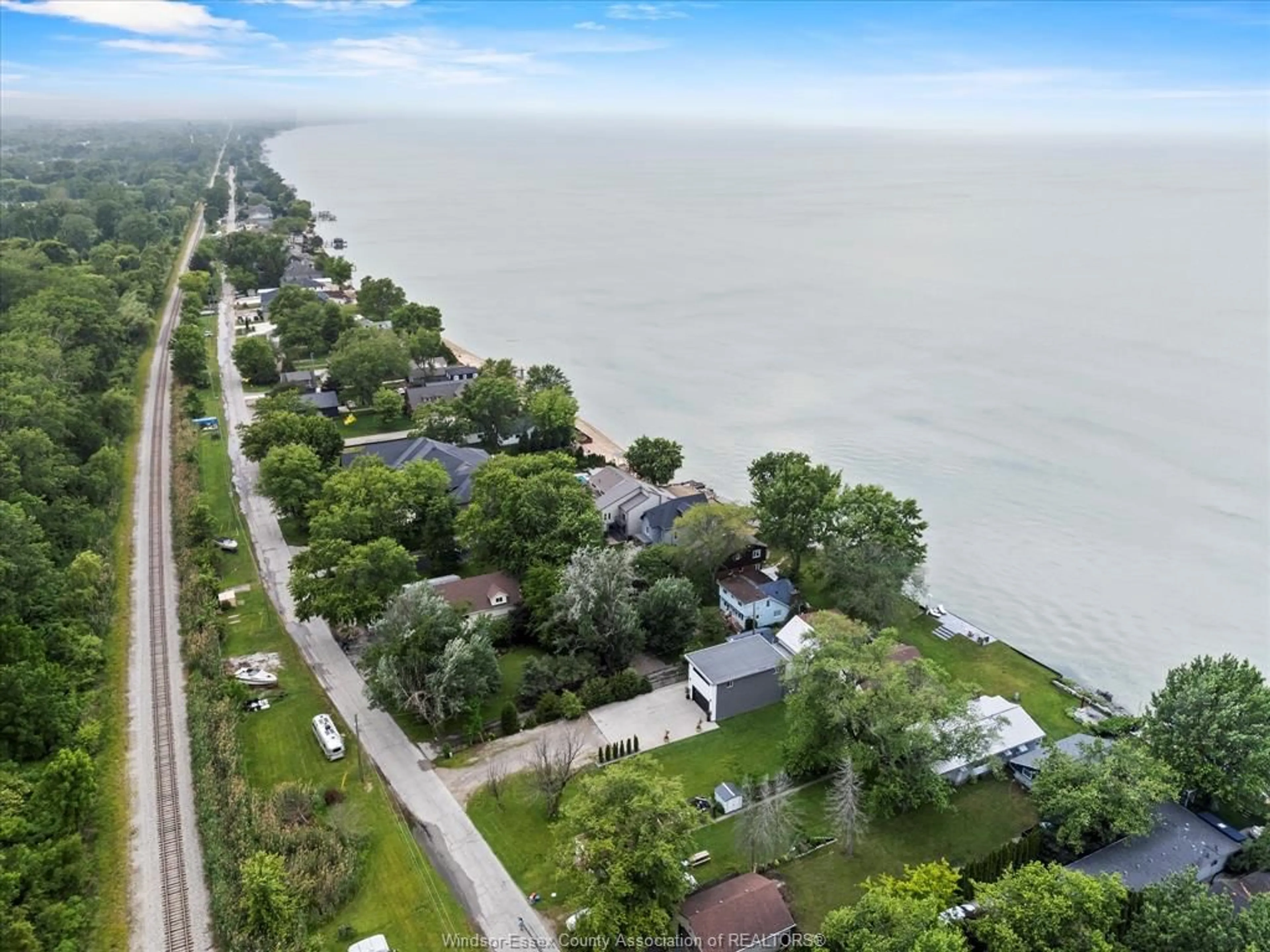 A pic from outside/outdoor area/front of a property/back of a property/a pic from drone, water/lake/river/ocean view for 1674 CAILLE Ave, Lakeshore Ontario N8L 0J4