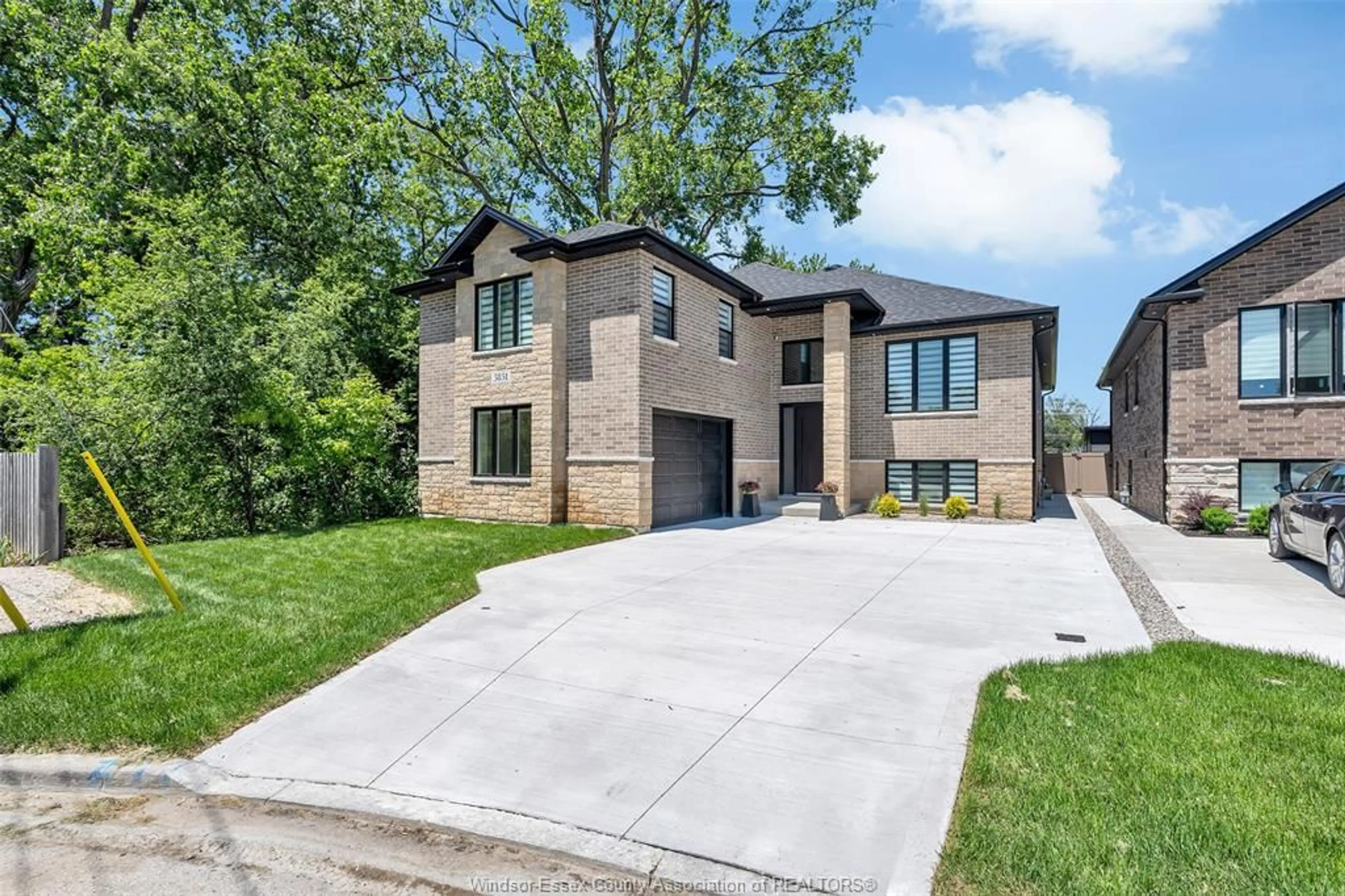 Home with brick exterior material, street for 3851 RONALD Ave, Windsor Ontario N9G 1N2