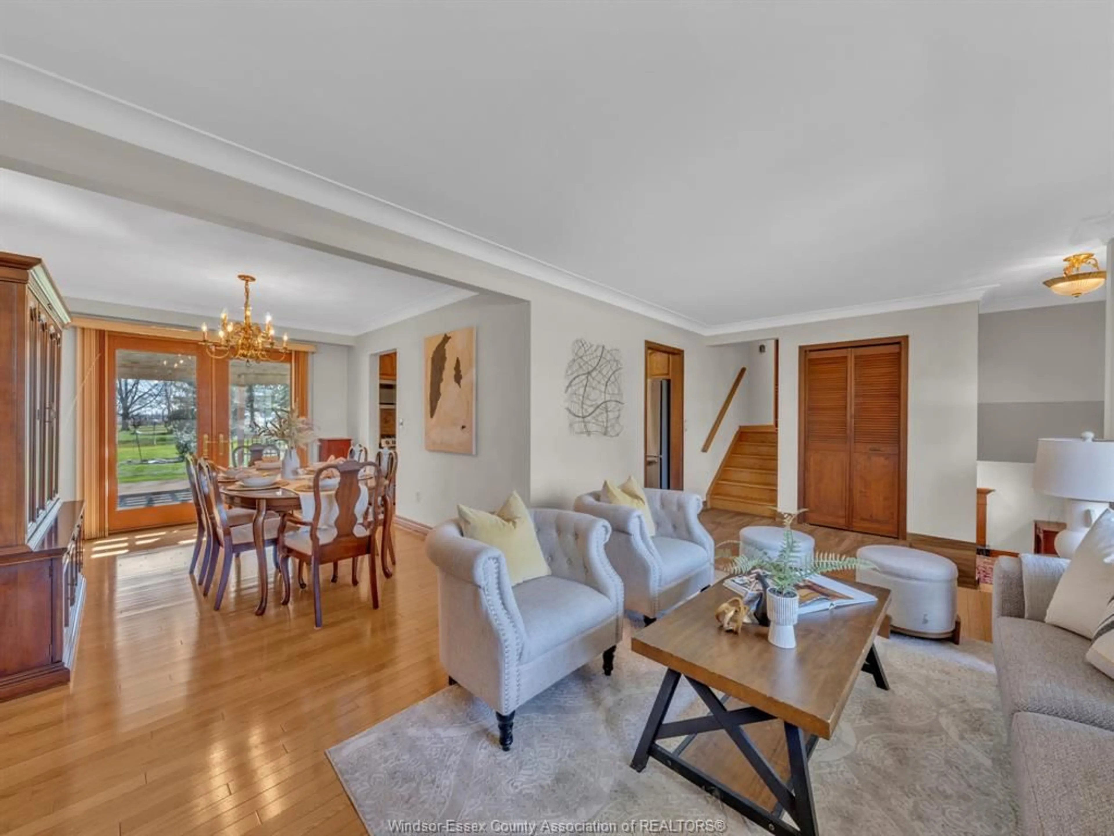 Living room with furniture, wood/laminate floor for 2725 BOUFFARD Rd, LaSalle Ontario N9H 1W3