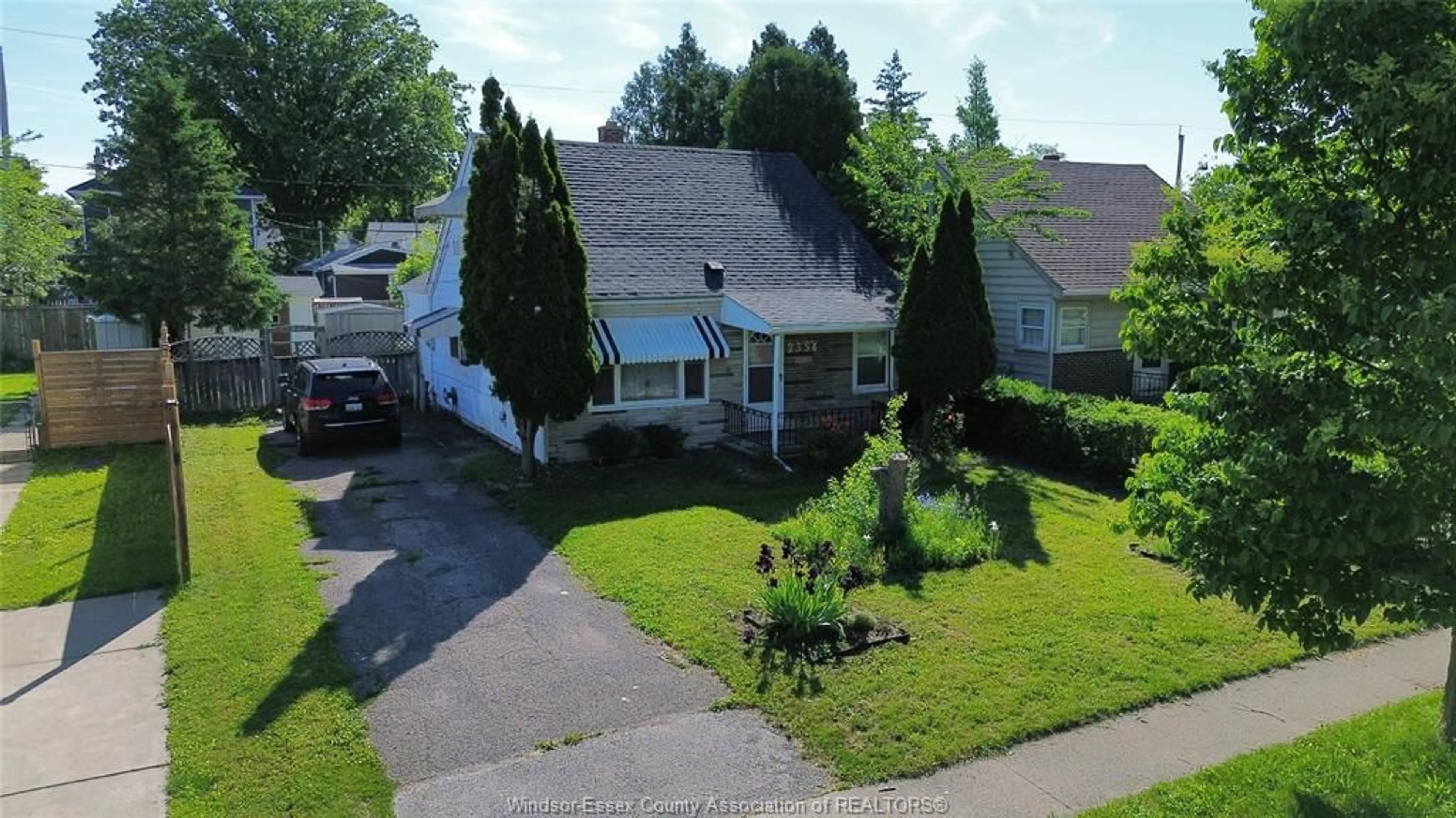 A pic from outside/outdoor area/front of a property/back of a property/a pic from drone, street for 2354 Highland Ave, Windsor Ontario N8X 3S5