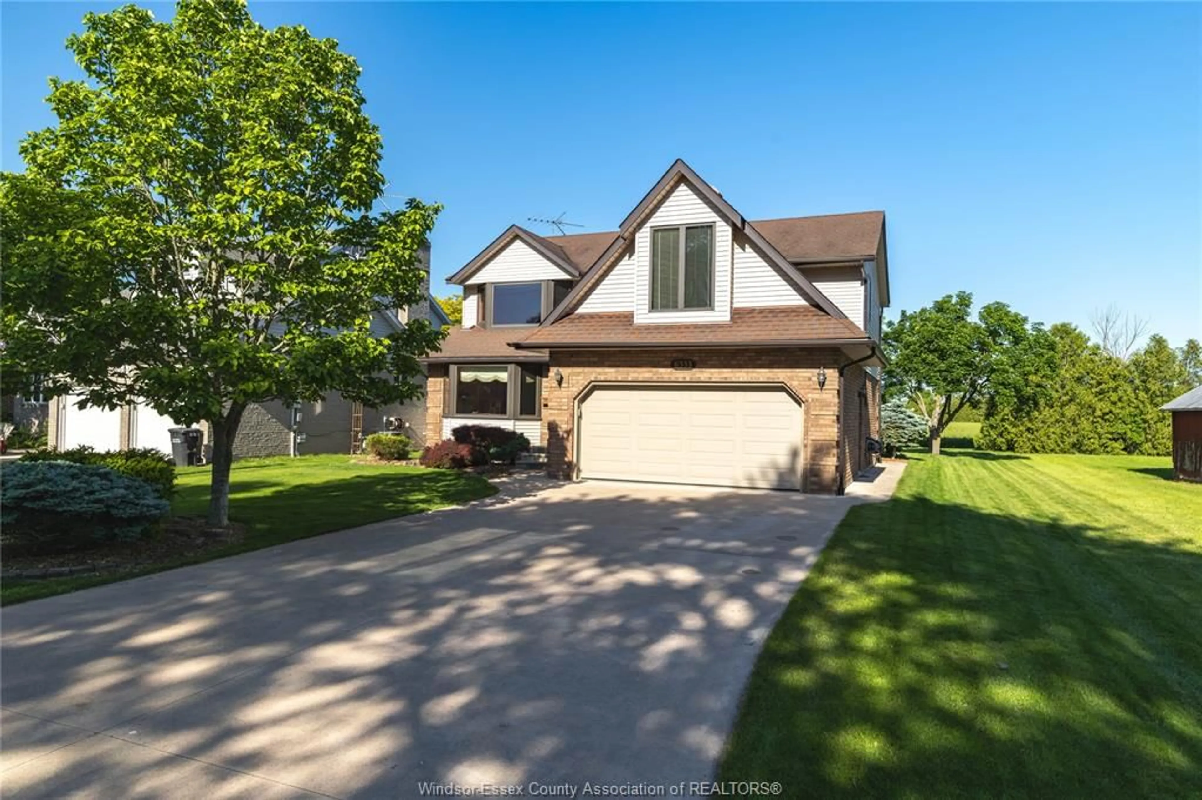 Home with brick exterior material, street for 6335 AINSLIE Ave, Lakeshore Ontario N0P 1J0