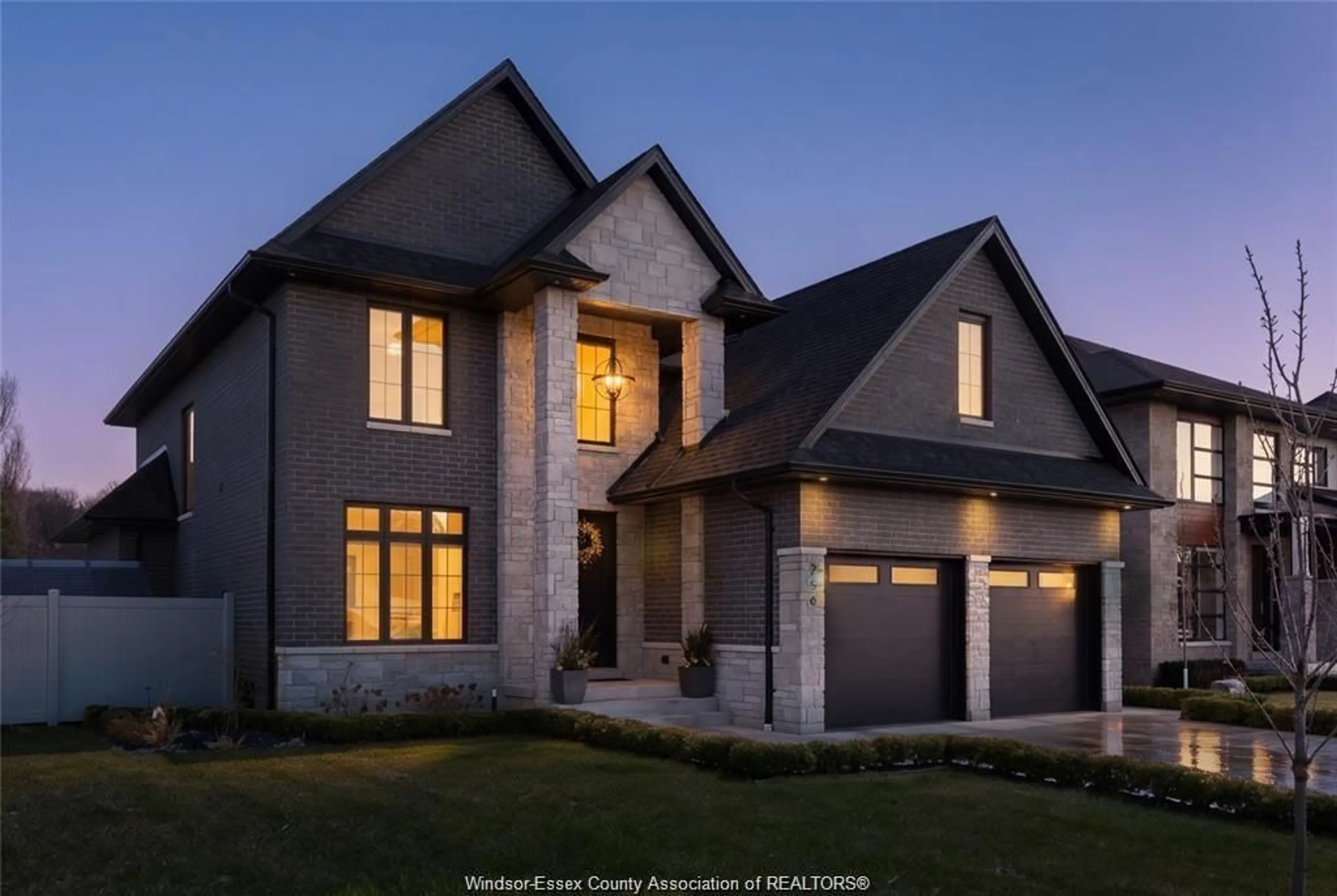 Home with brick exterior material, street for 256 XAVIER Cir, Lakeshore Ontario N0R 1A0