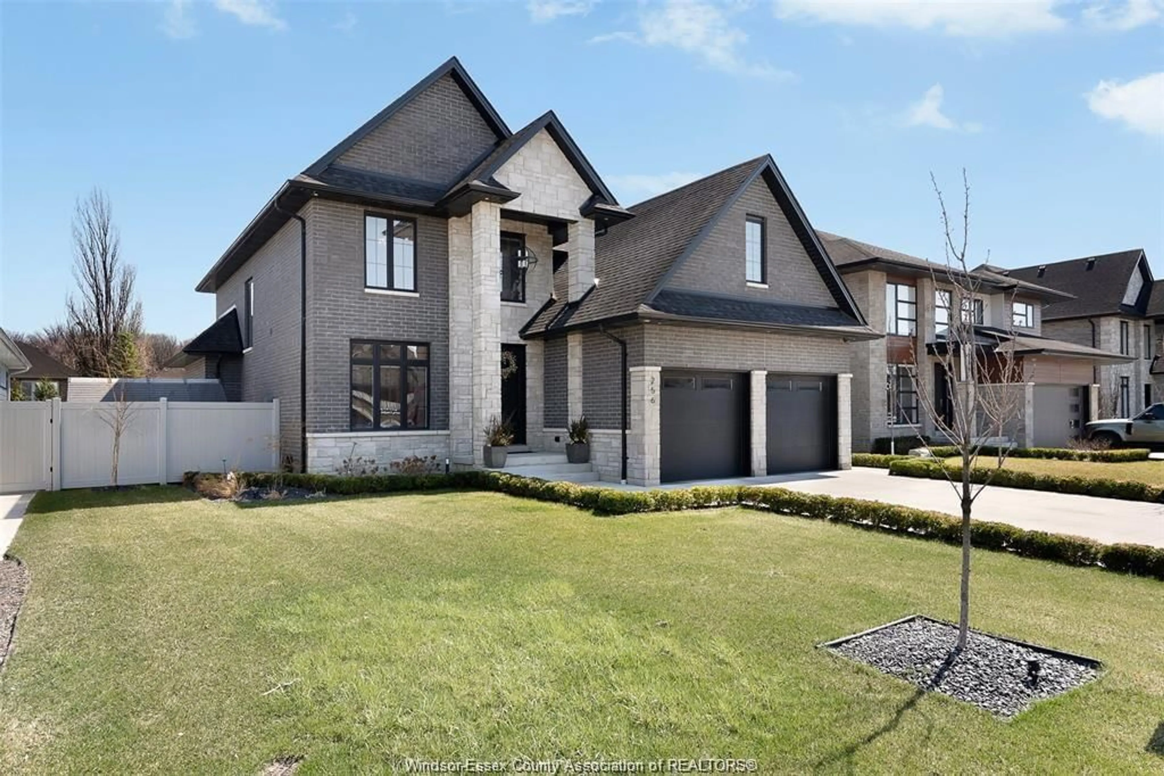 Home with brick exterior material, street for 256 XAVIER Cir, Lakeshore Ontario N0R 1A0