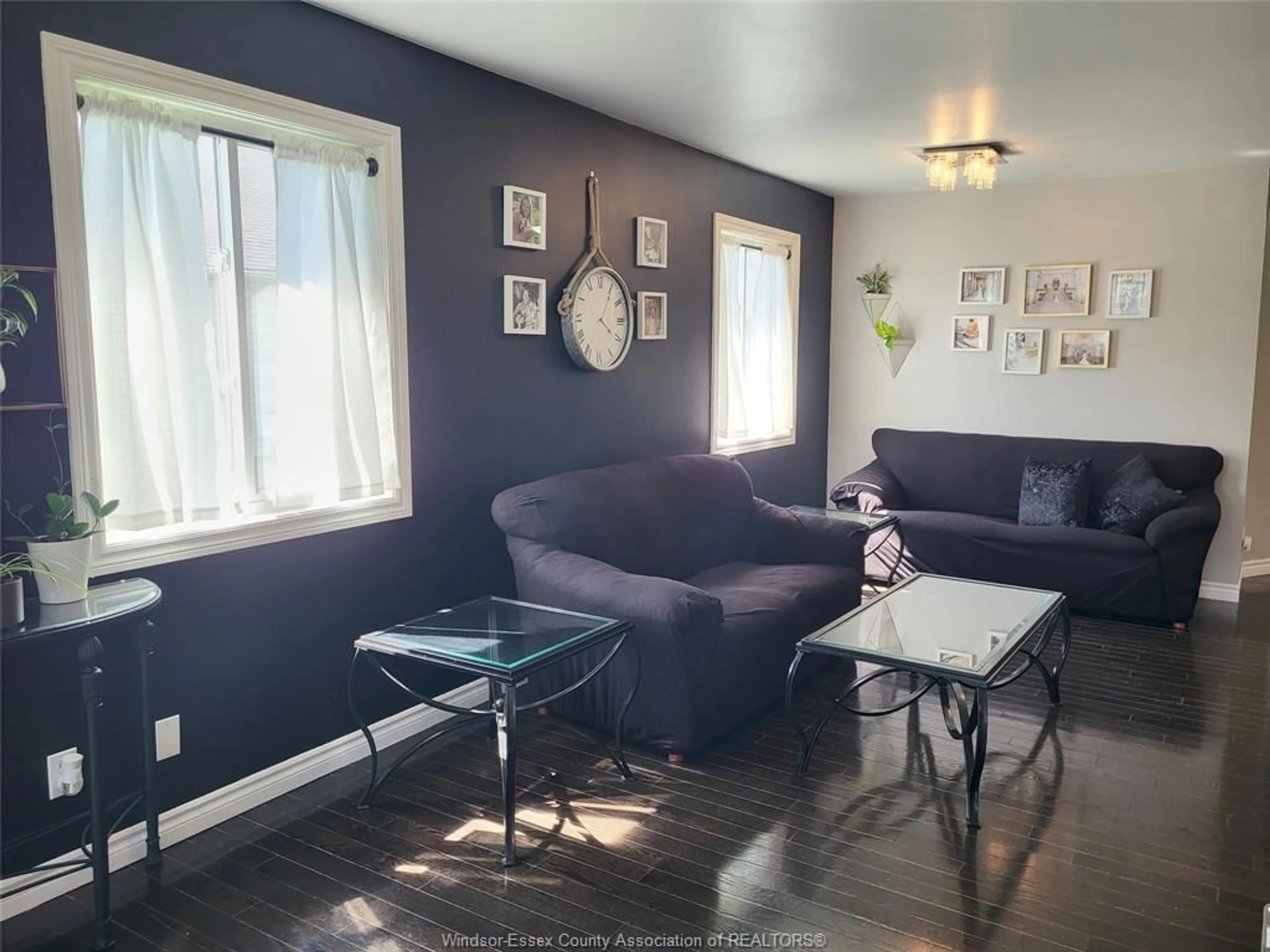 Living room with furniture, wood/laminate floor for 2324 LAMONT St, Windsor Ontario N9E 4X3
