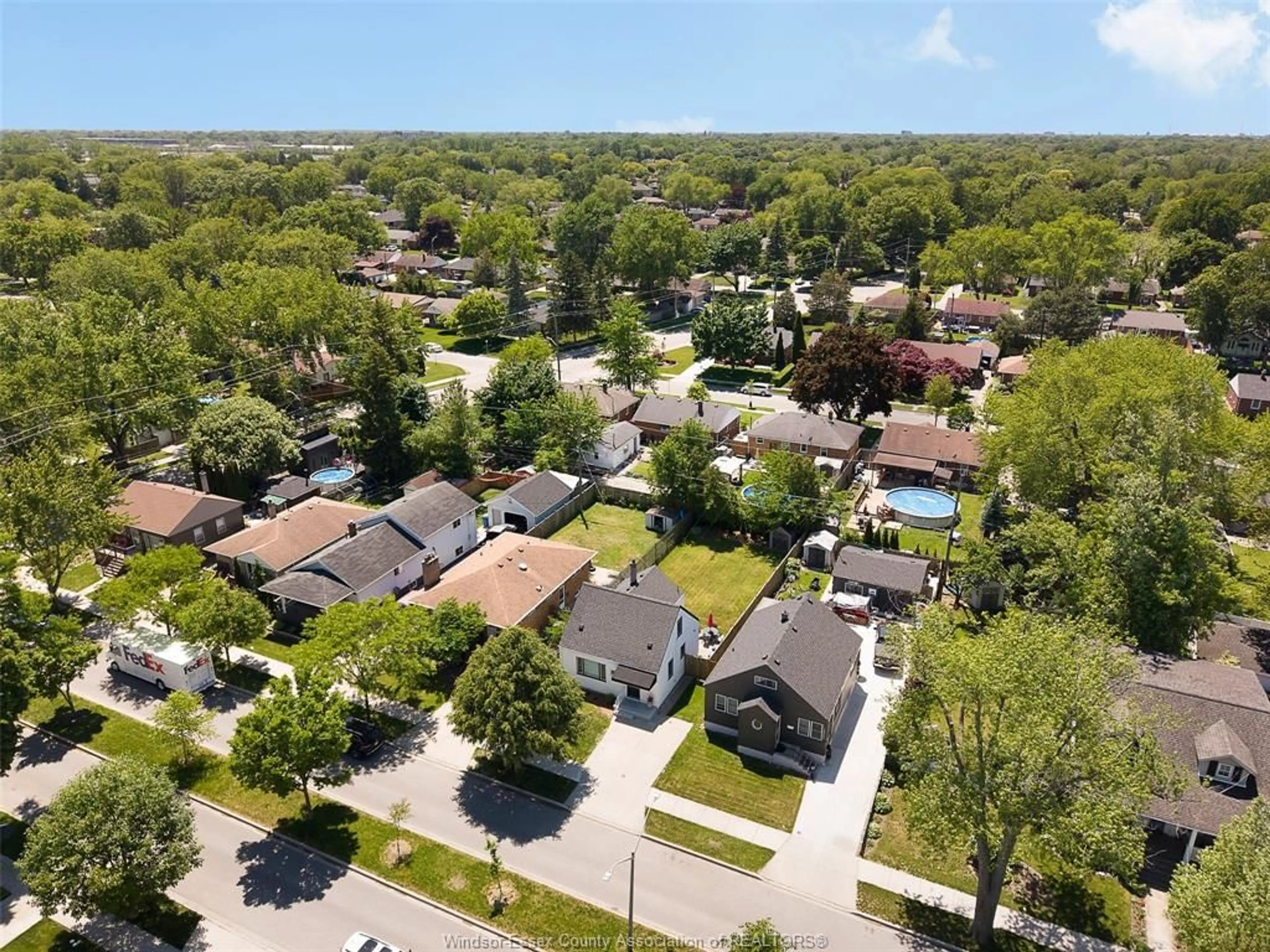 A pic from outside/outdoor area/front of a property/back of a property/a pic from drone, street for 1071 Fairview Blvd, Windsor Ontario N8S 3E6