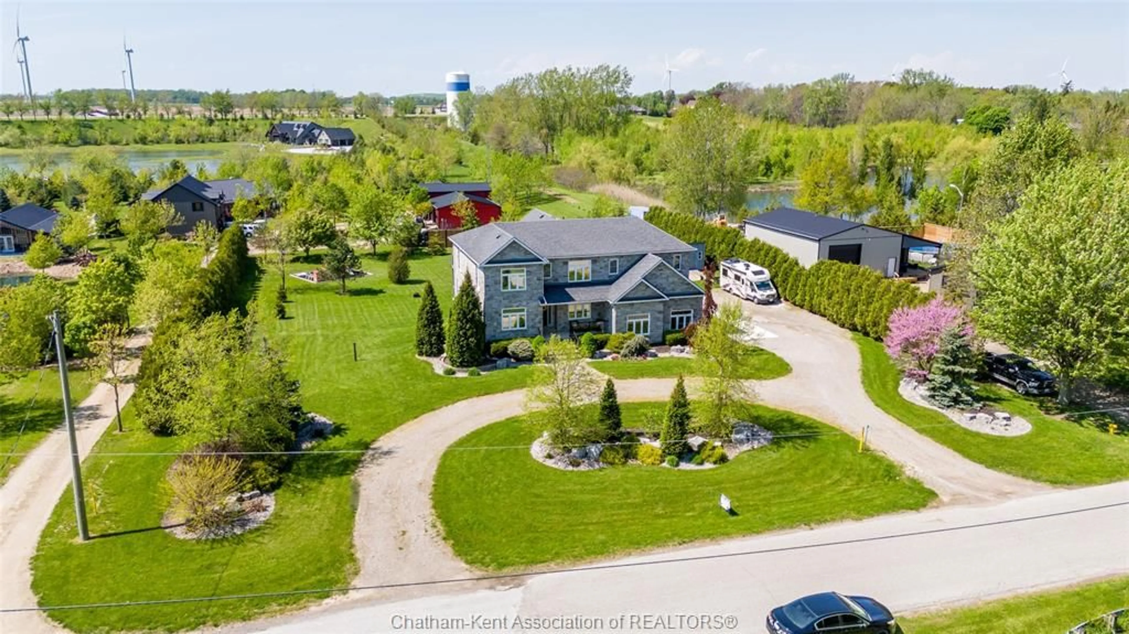 A pic from outside/outdoor area/front of a property/back of a property/a pic from drone, street for 8545 Water St, Cedar Springs Ontario N0P 1E0