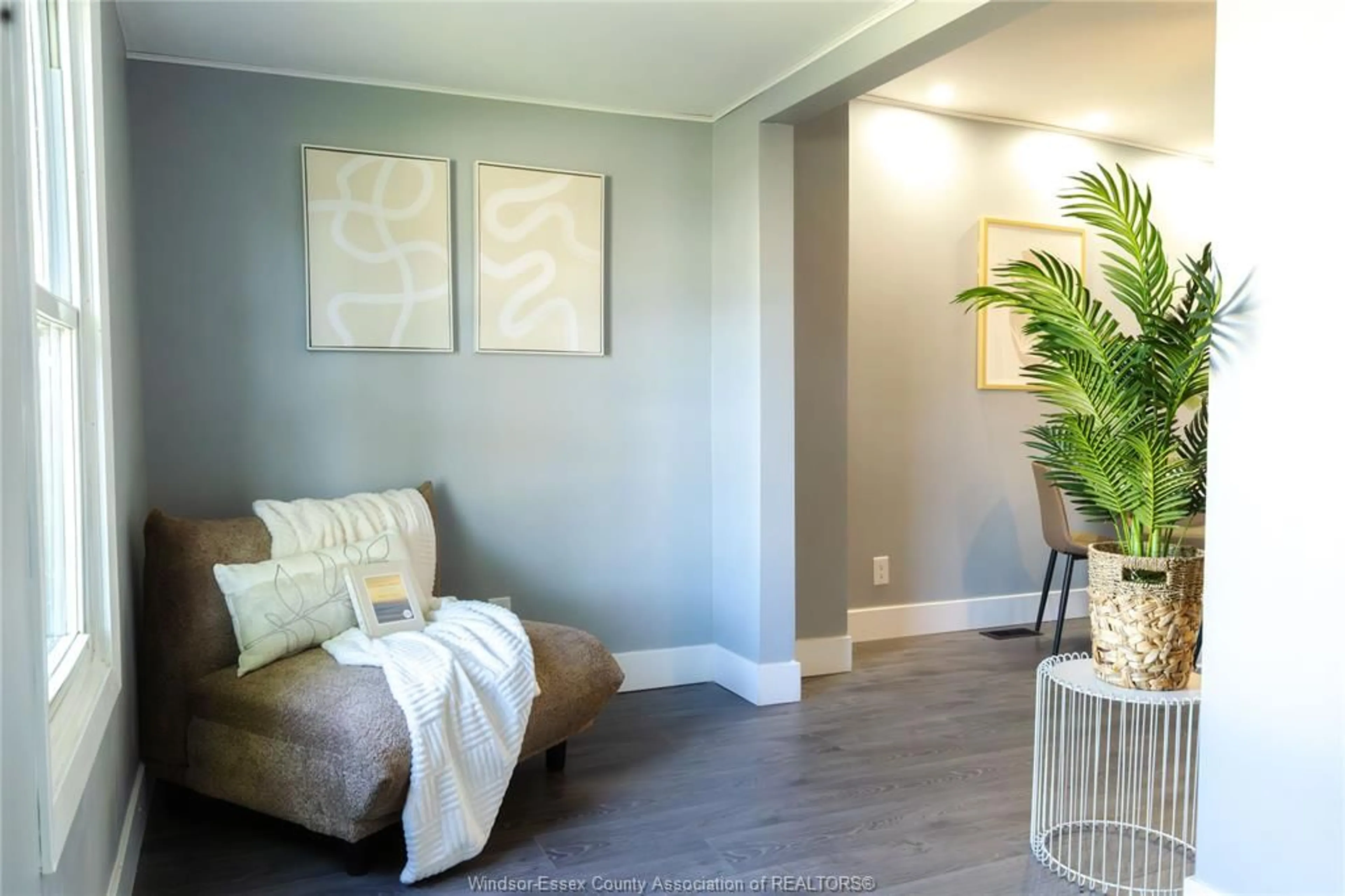 Living room with furniture, wood/laminate floor for 622 LABUTE, Tecumseh Ontario N8N 2B3