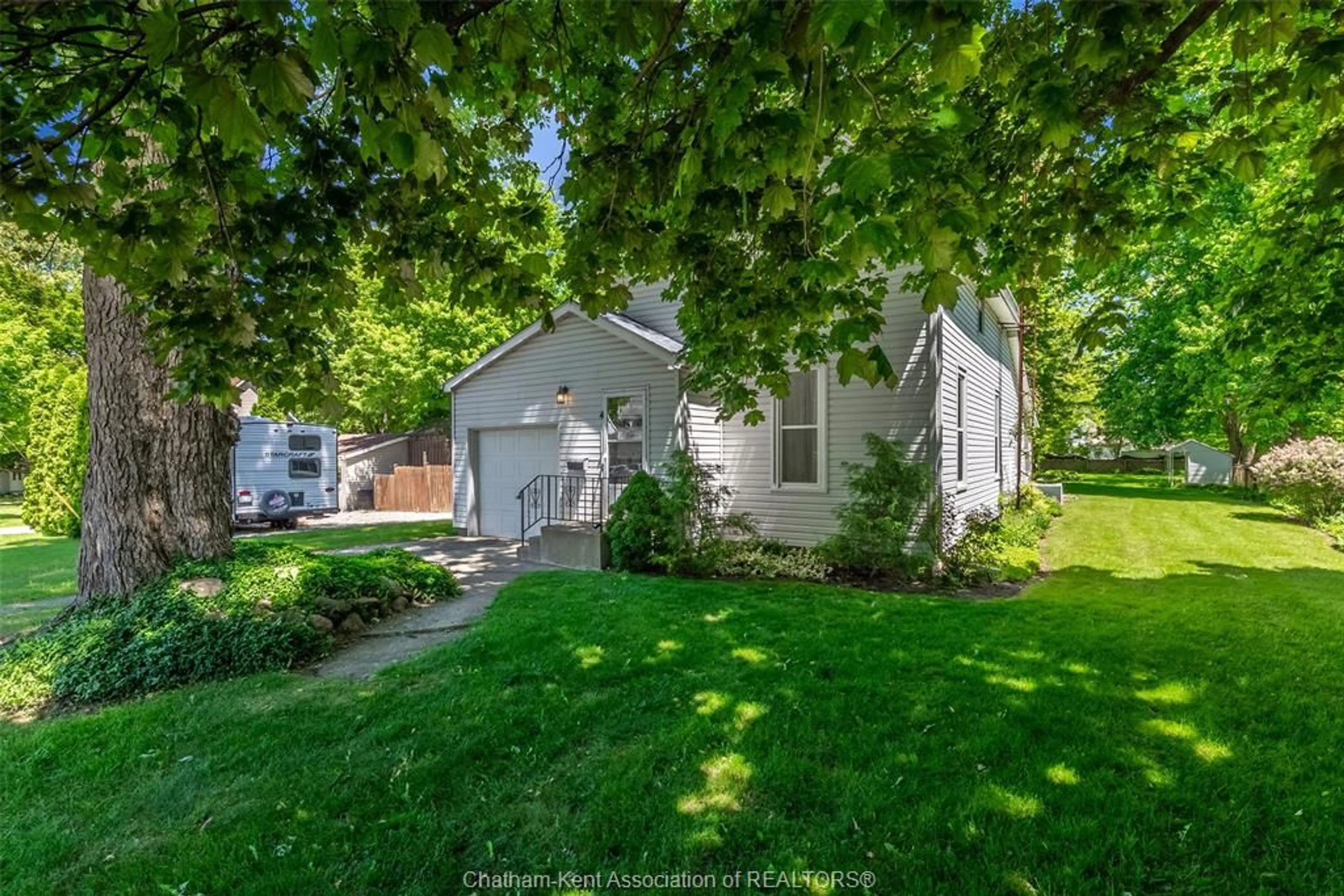A pic from outside/outdoor area/front of a property/back of a property/a pic from drone, street for 4 Maple St, Ridgetown Ontario N0P 2K0