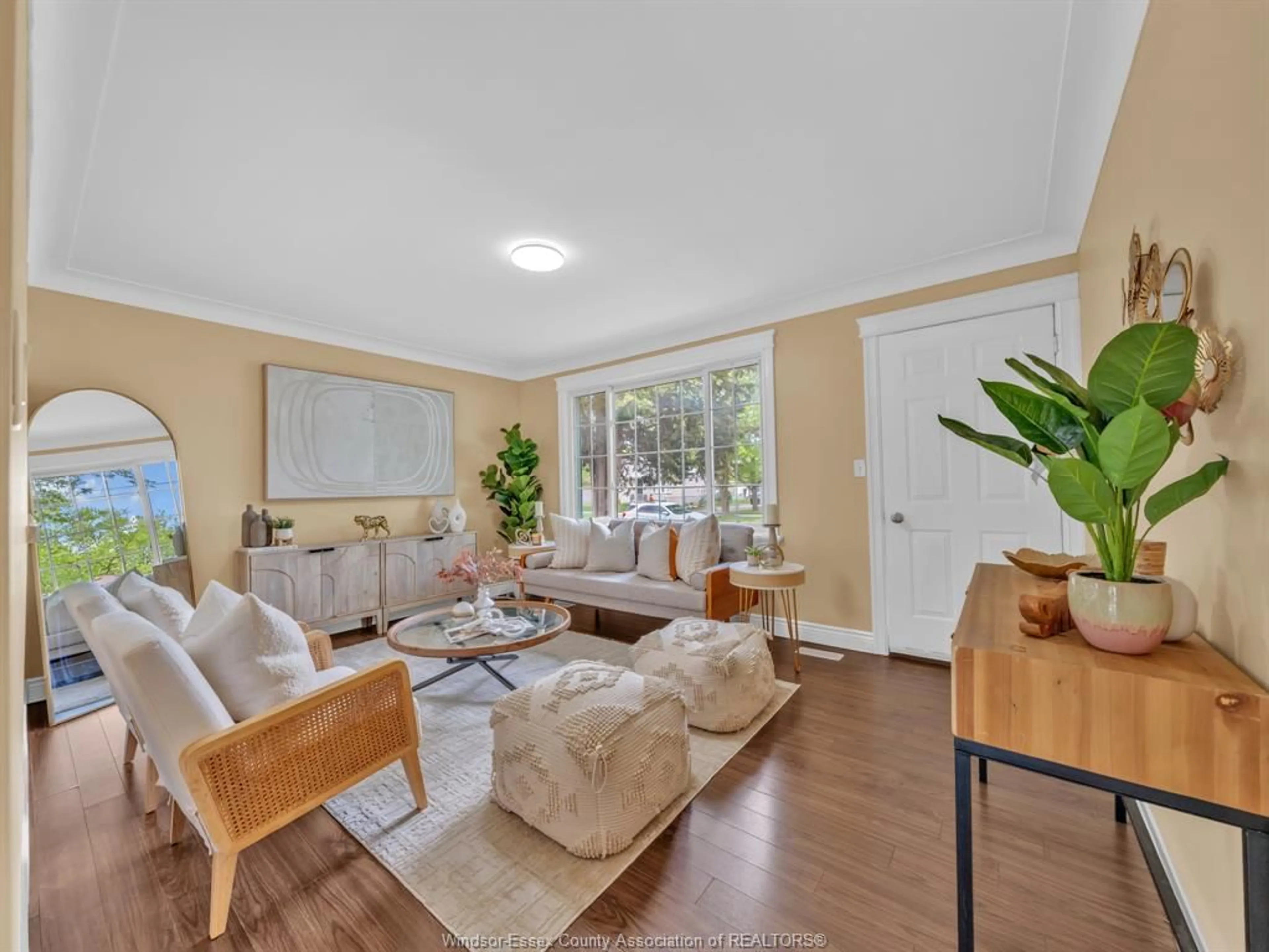 Living room with furniture, wood/laminate floor for 1583 FERNDALE Ave, Windsor Ontario N8T 2K3