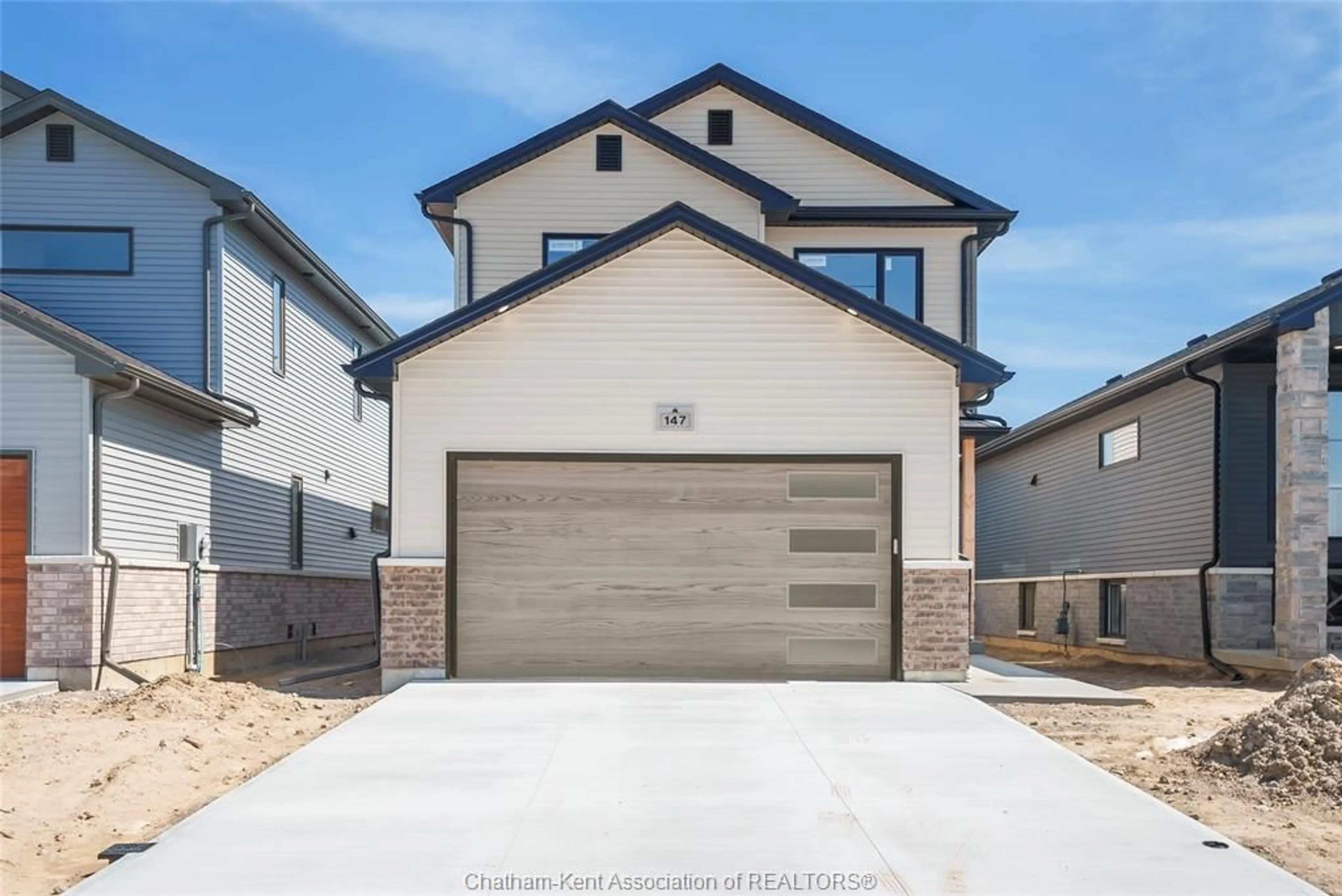 Home with brick exterior material, street for 199 IRONWOOD Trail, Chatham Ontario N7M 0T3