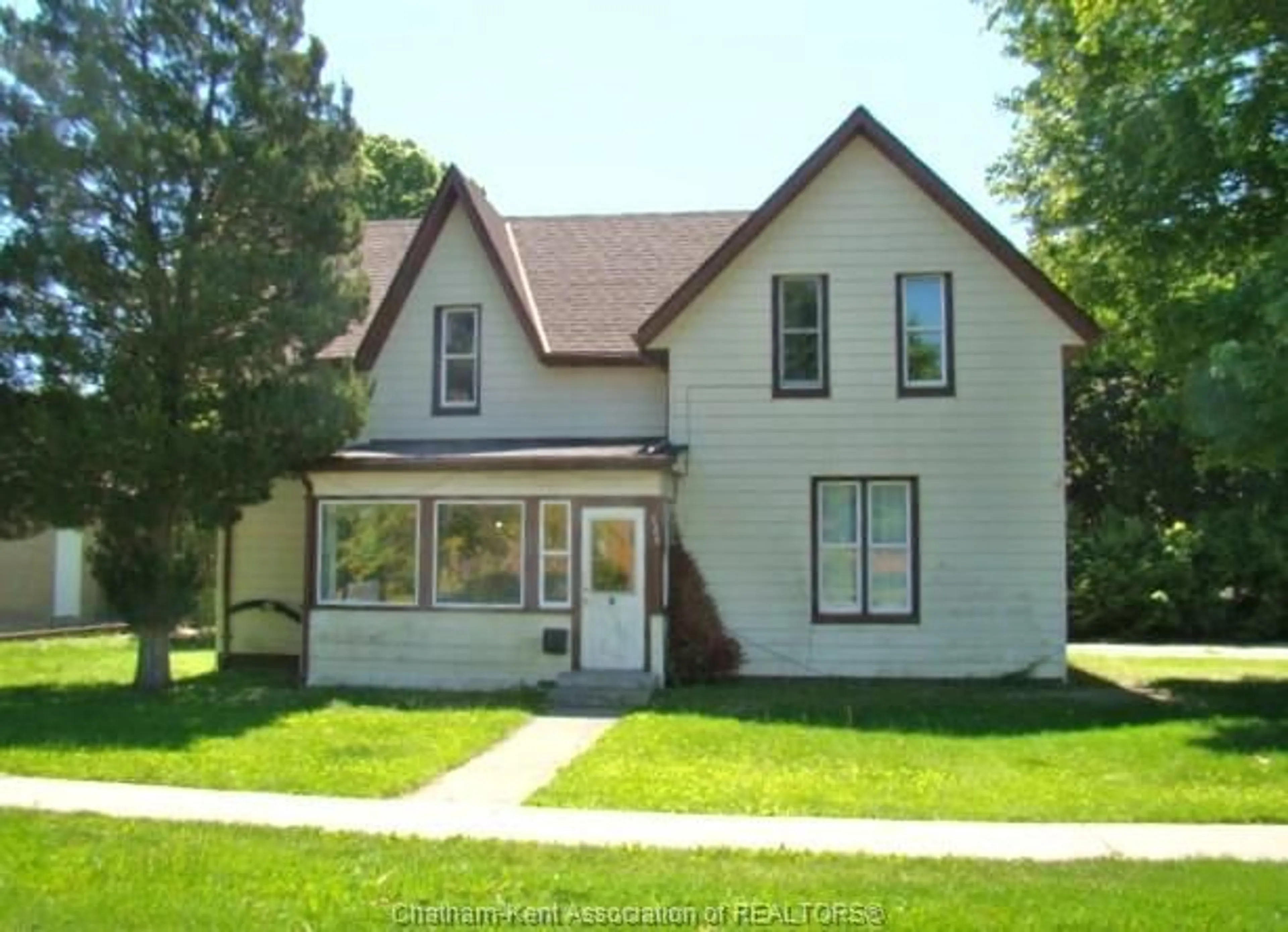 Home with vinyl exterior material, street for 125 MAIN St, Ridgetown Ontario N0P 2C0