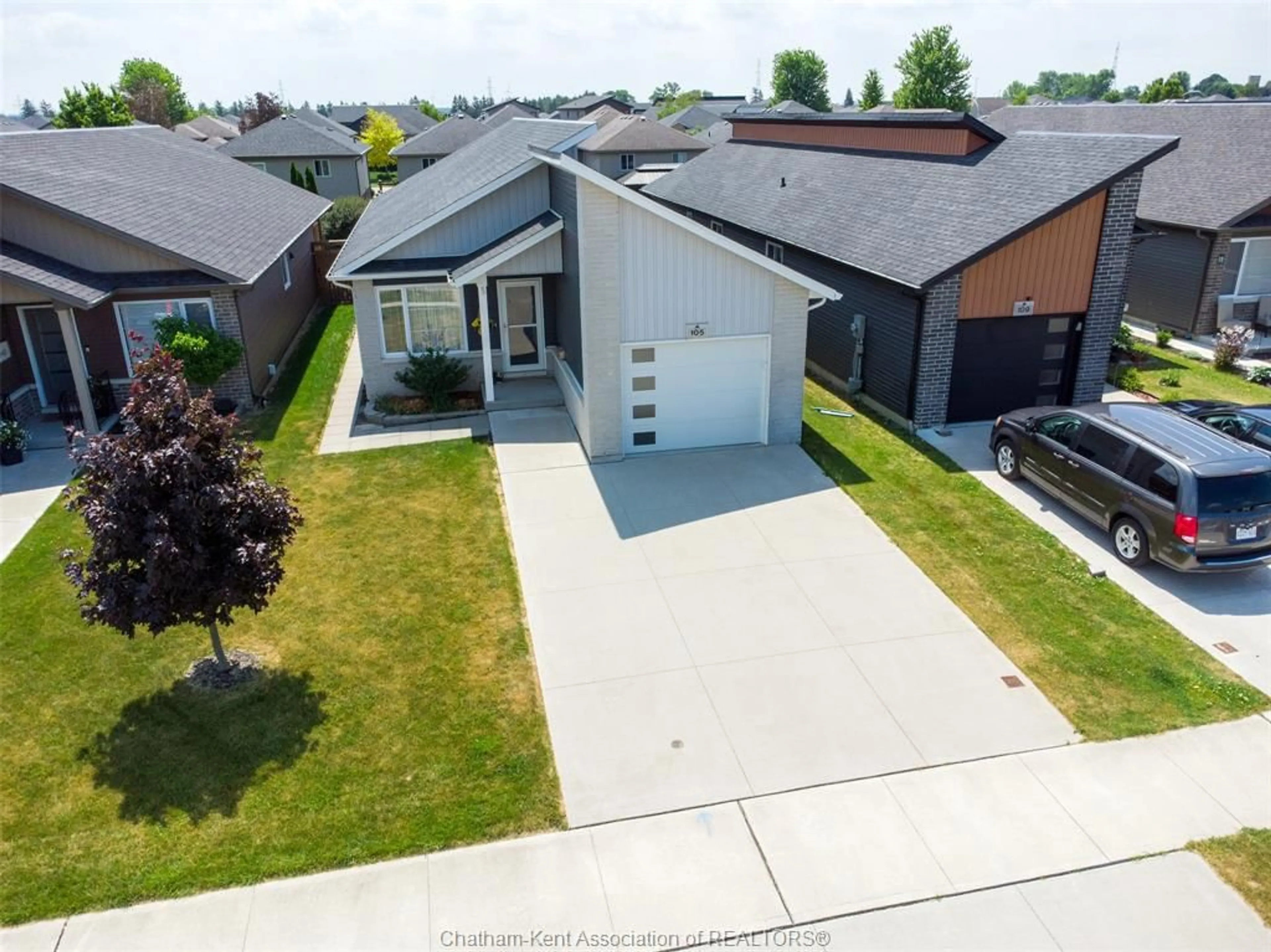 A pic from outside/outdoor area/front of a property/back of a property/a pic from drone, street for 105 Moonstone Cres, Chatham Ontario N7M 0S1