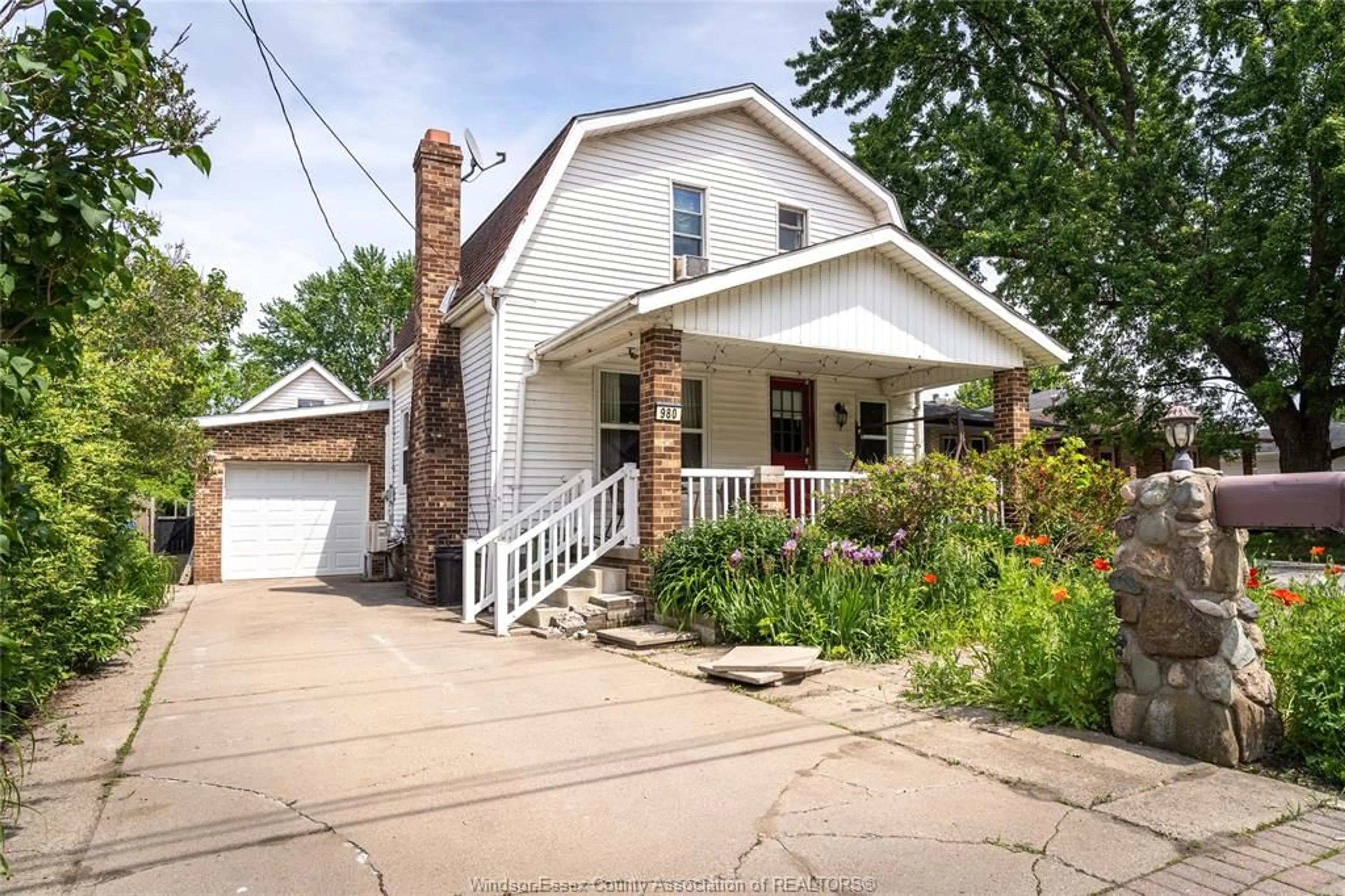 Home with brick exterior material, street for 980 RIVERDALE Ave, Windsor Ontario N8S 4C3