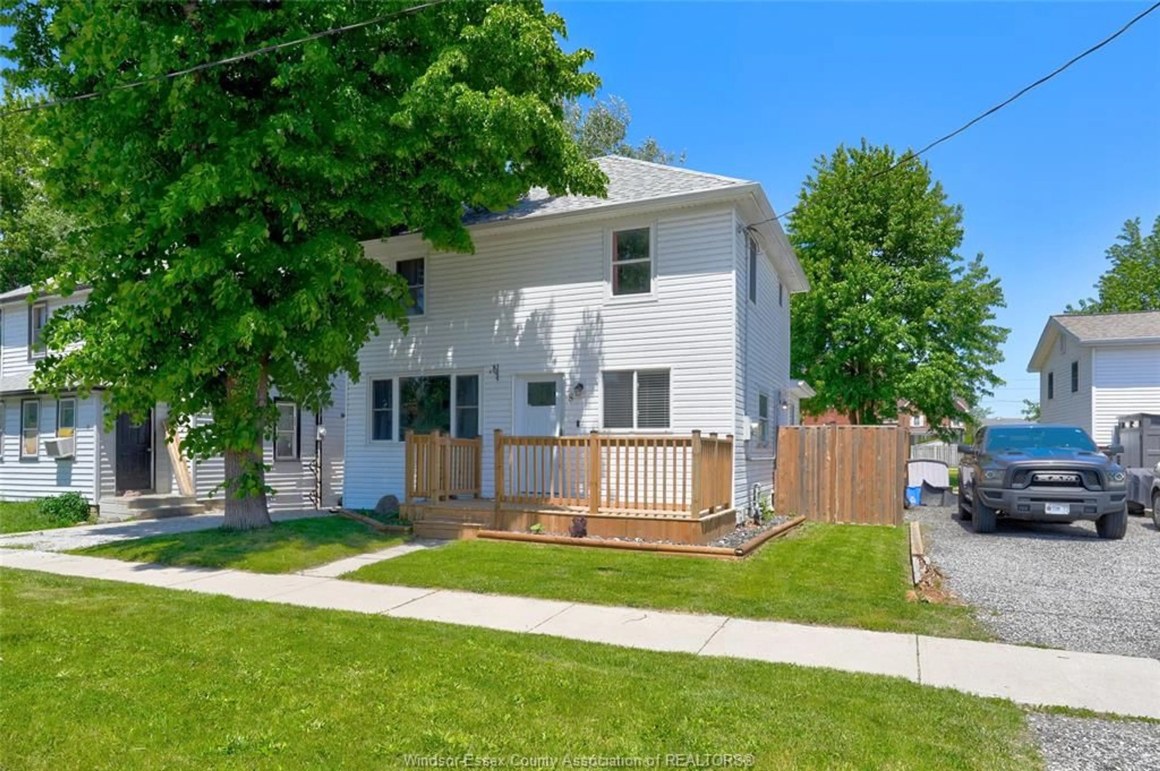 Home with vinyl exterior material, street for 8 ST. CLAIR St, Tilbury Ontario N0P 2L0