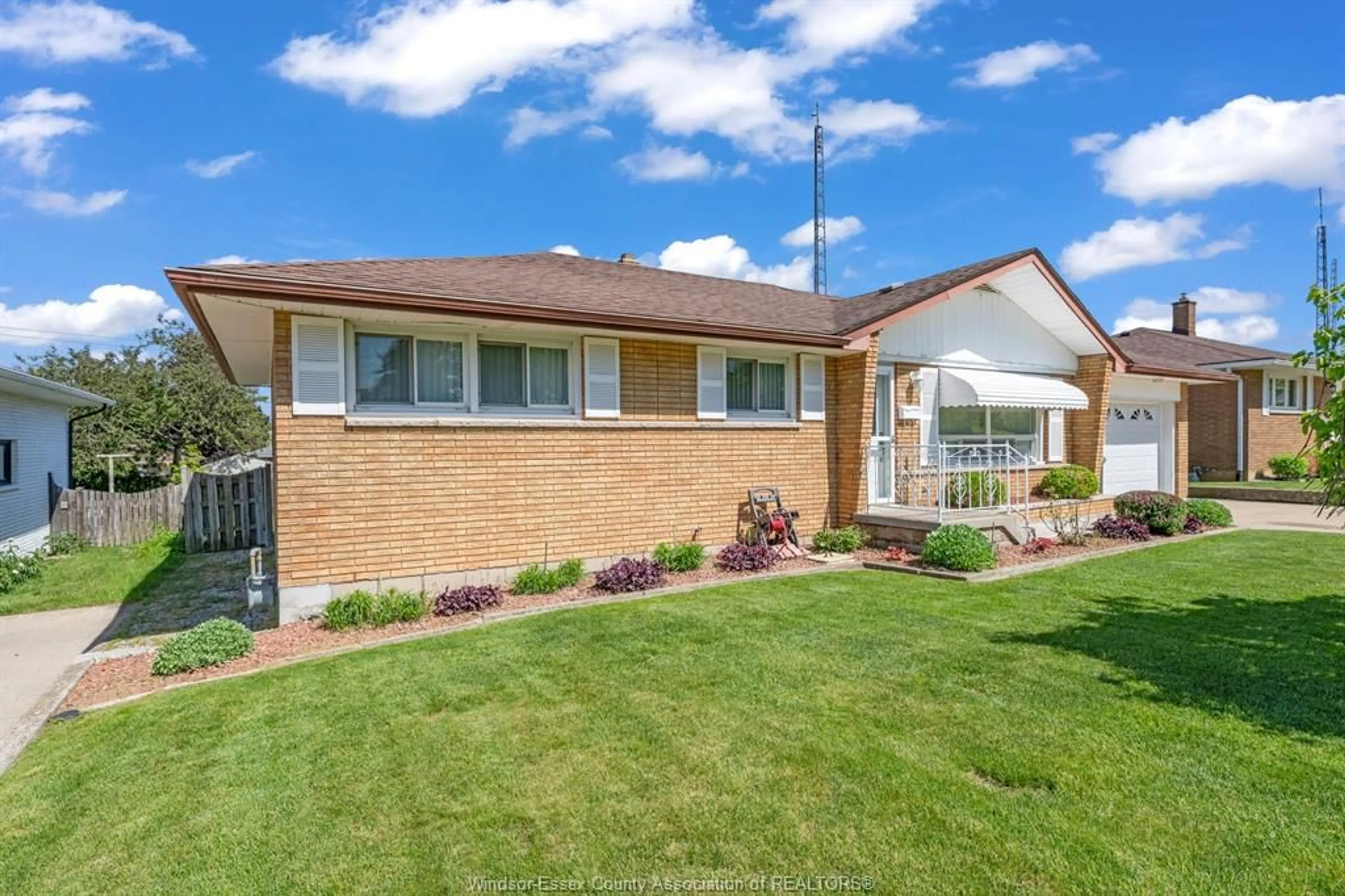 Home with brick exterior material, street for 14 Roger St, Leamington Ontario N8H 3N9