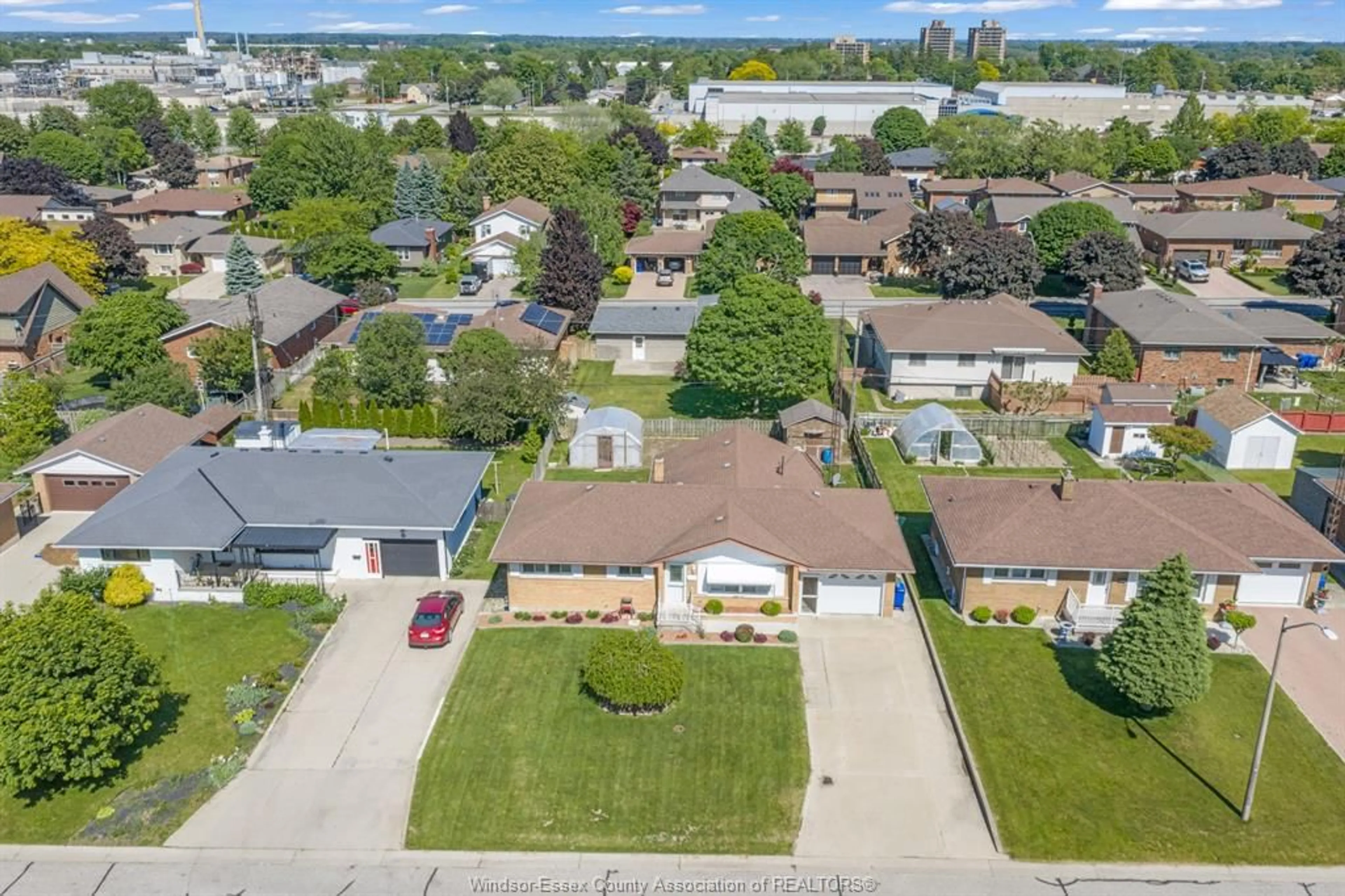 A pic from outside/outdoor area/front of a property/back of a property/a pic from drone, street for 14 Roger St, Leamington Ontario N8H 3N9