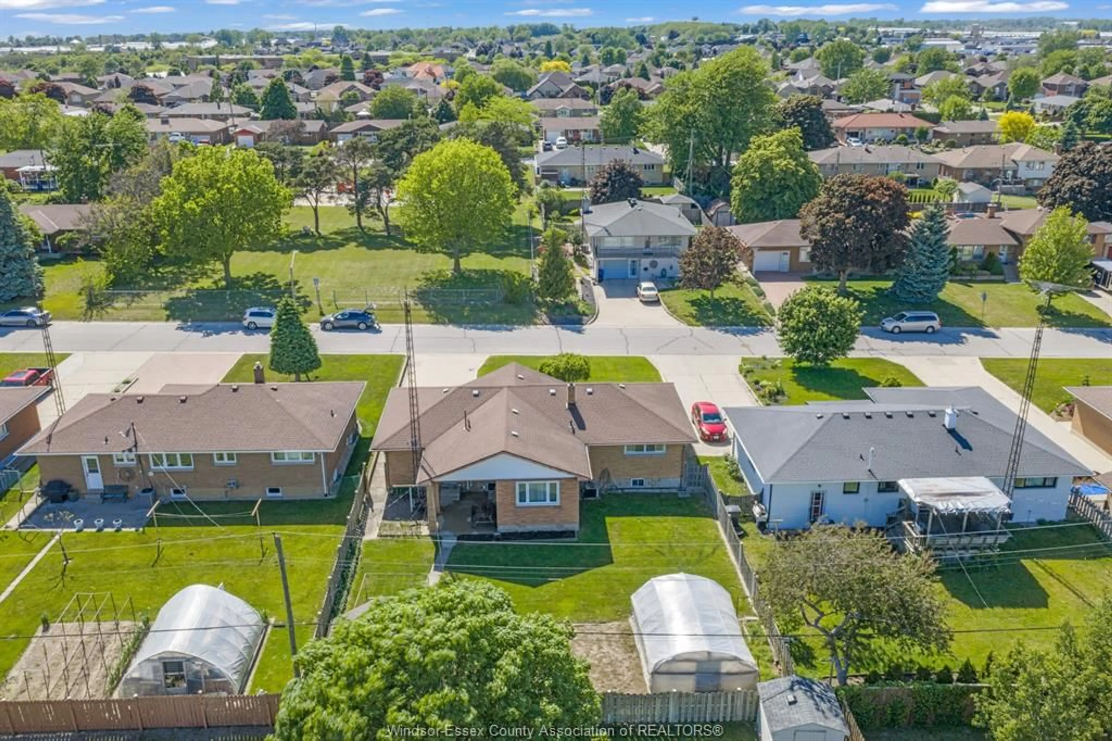 A pic from outside/outdoor area/front of a property/back of a property/a pic from drone, street for 14 Roger St, Leamington Ontario N8H 3N9