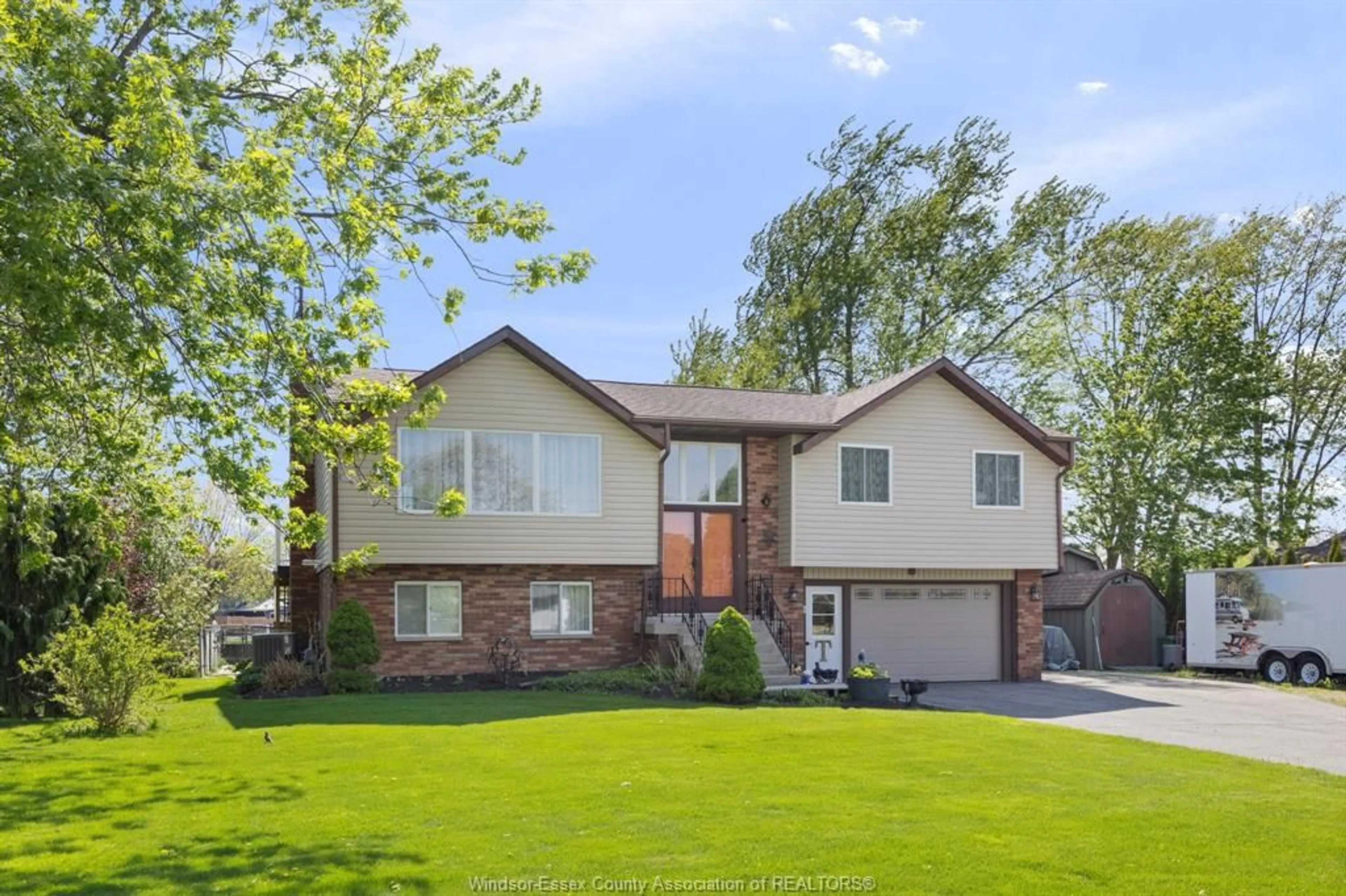 Home with brick exterior material, street for 19079 BLUE WATER Ave, Lakeshore Ontario N0P 2L0