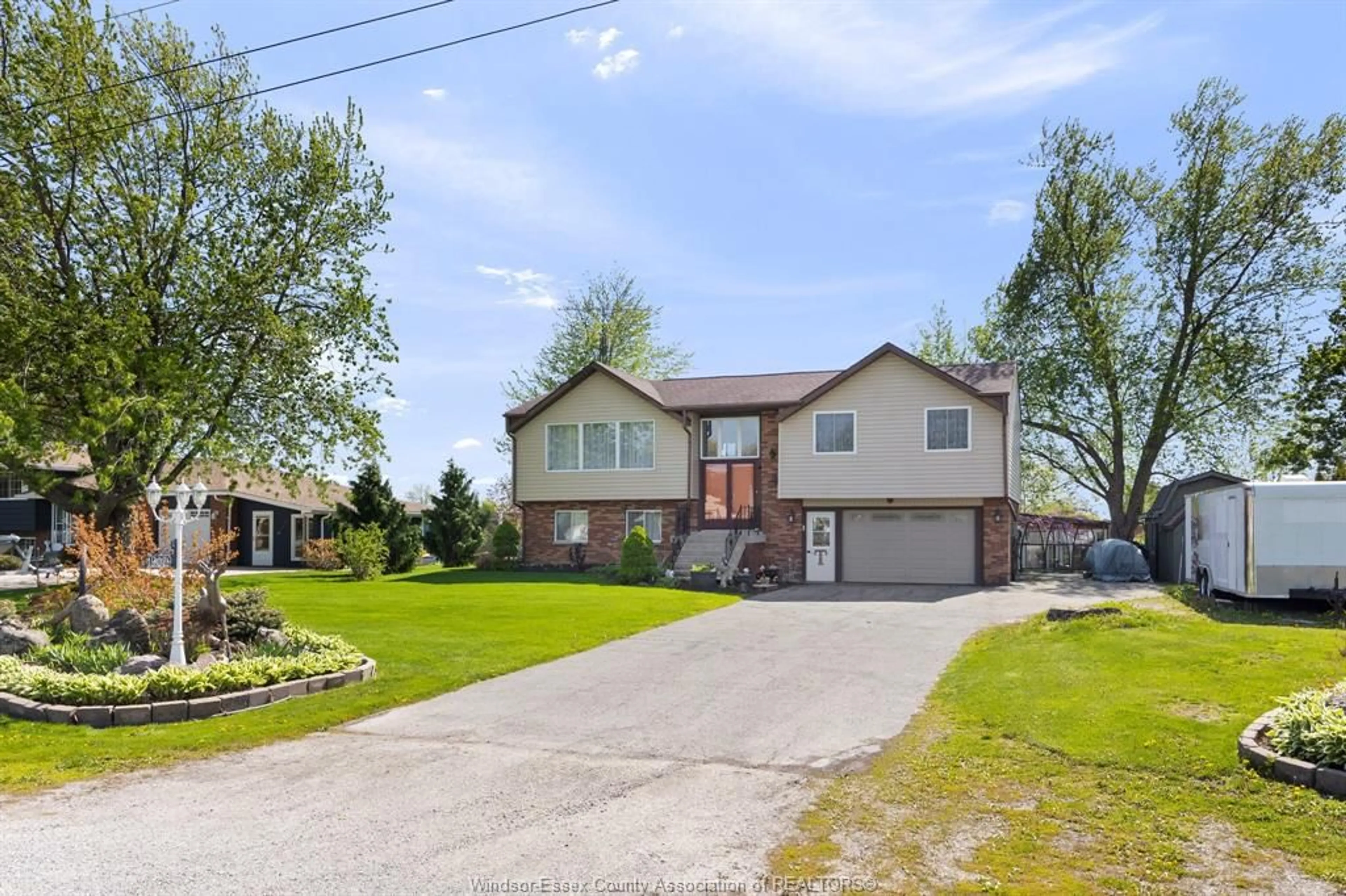 A pic from outside/outdoor area/front of a property/back of a property/a pic from drone, street for 19079 BLUE WATER Ave, Lakeshore Ontario N0P 2L0