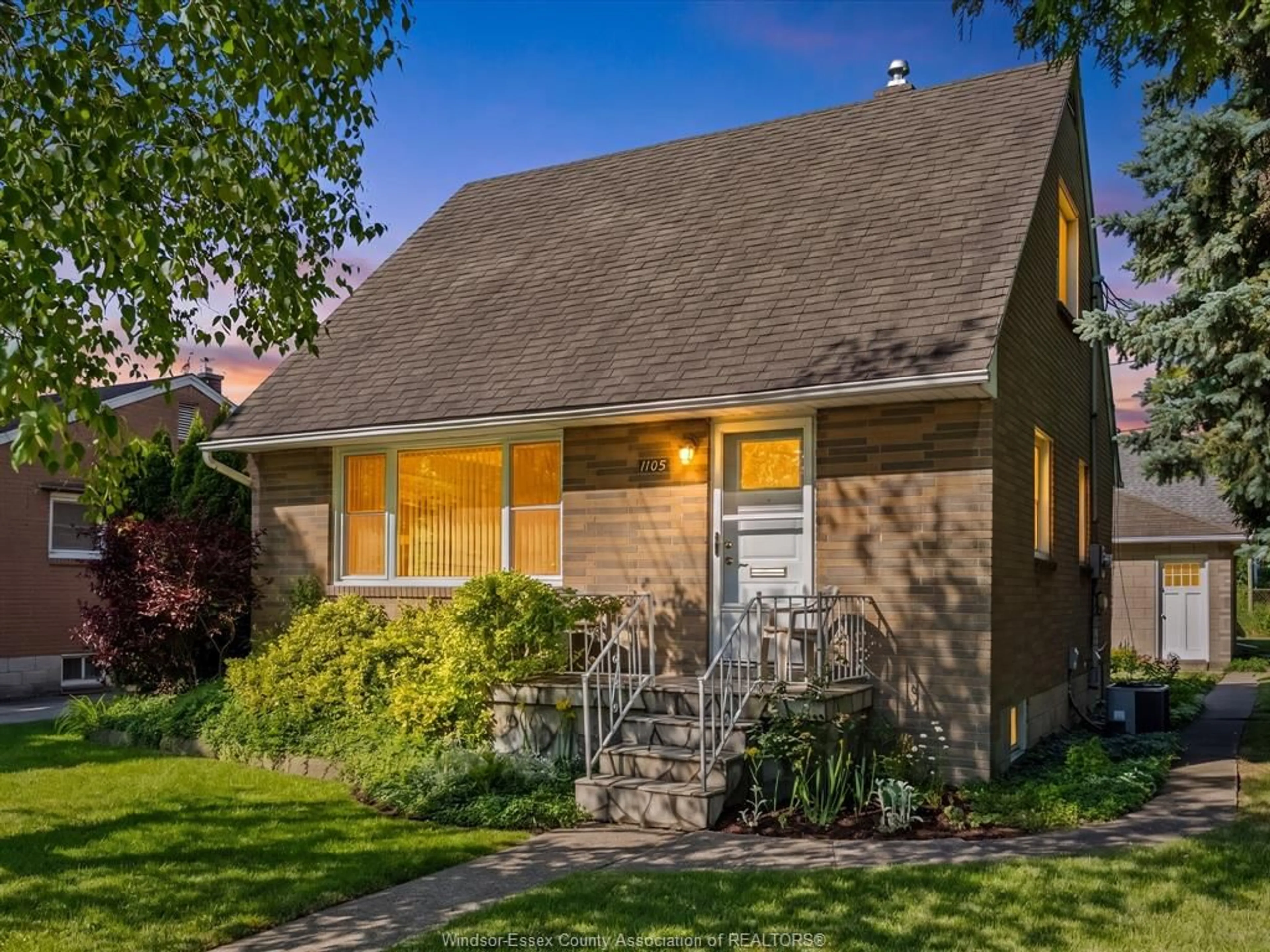 Home with vinyl exterior material, street for 1105 DOT Ave, Windsor Ontario N9C 3H9