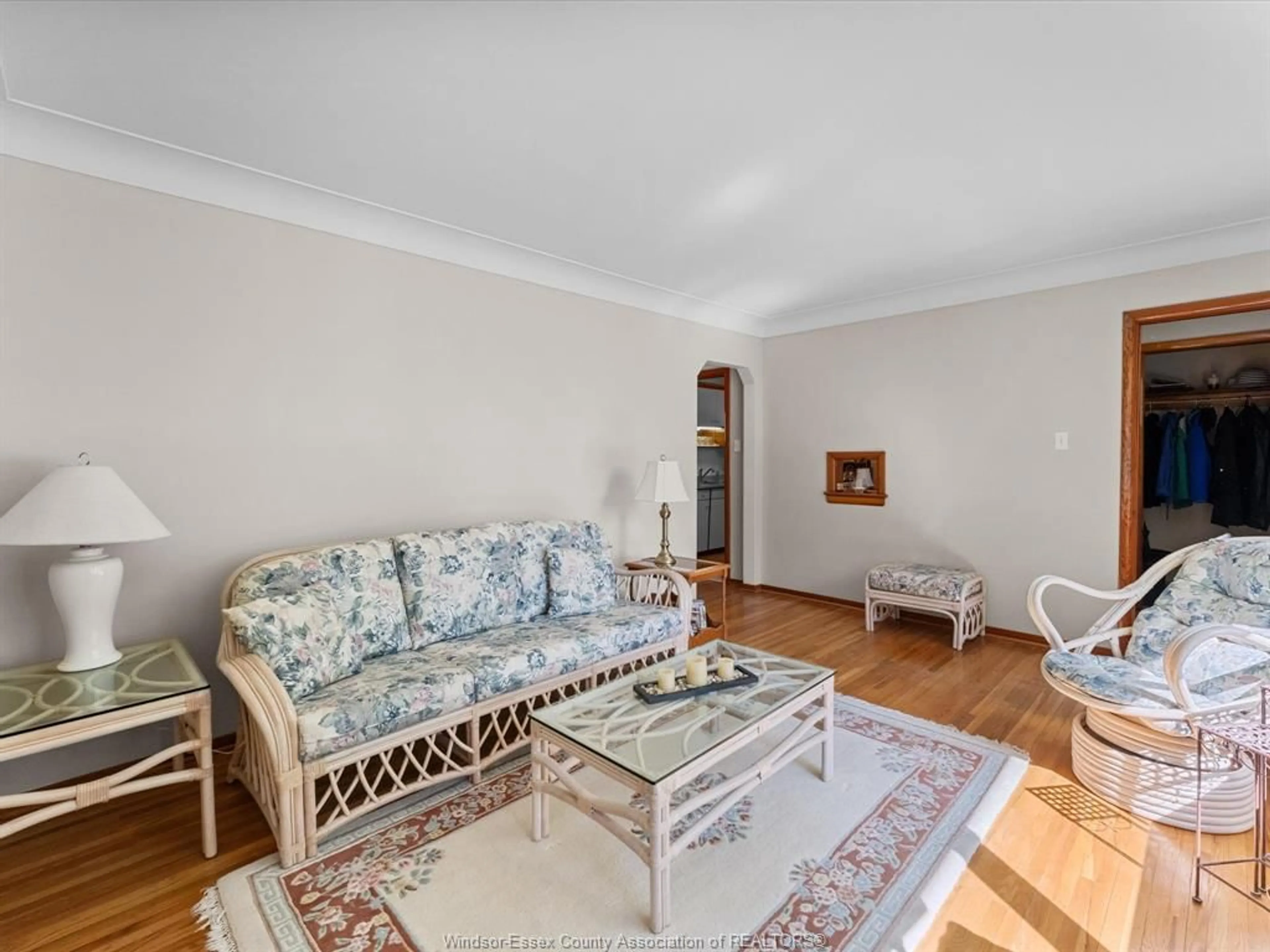 Living room with furniture, wood/laminate floor for 1105 DOT Ave, Windsor Ontario N9C 3H9