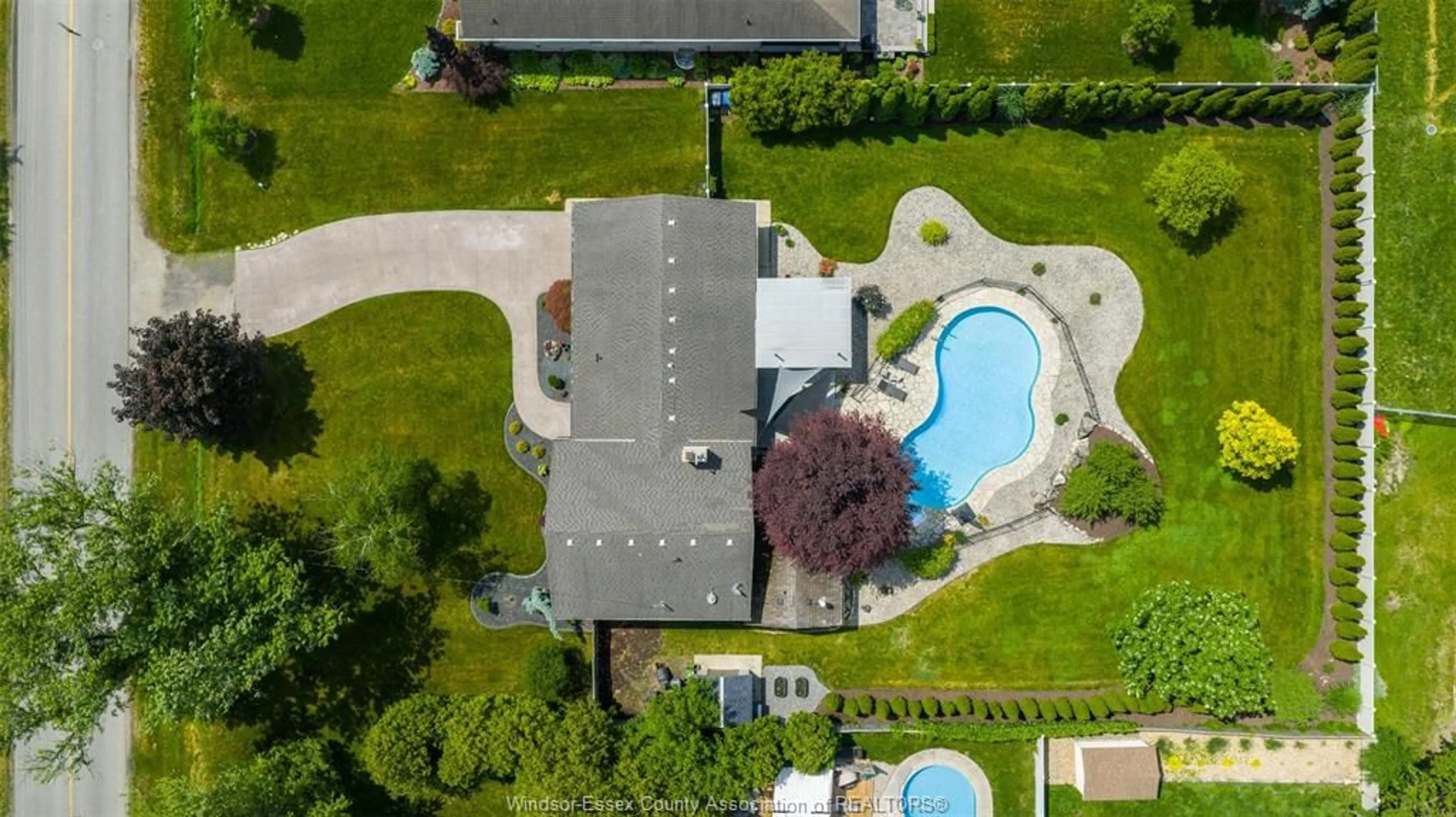 A pic from outside/outdoor area/front of a property/back of a property/a pic from drone, water/lake/river/ocean view for 421 Arlington, Tecumseh Ontario N8N 2K1